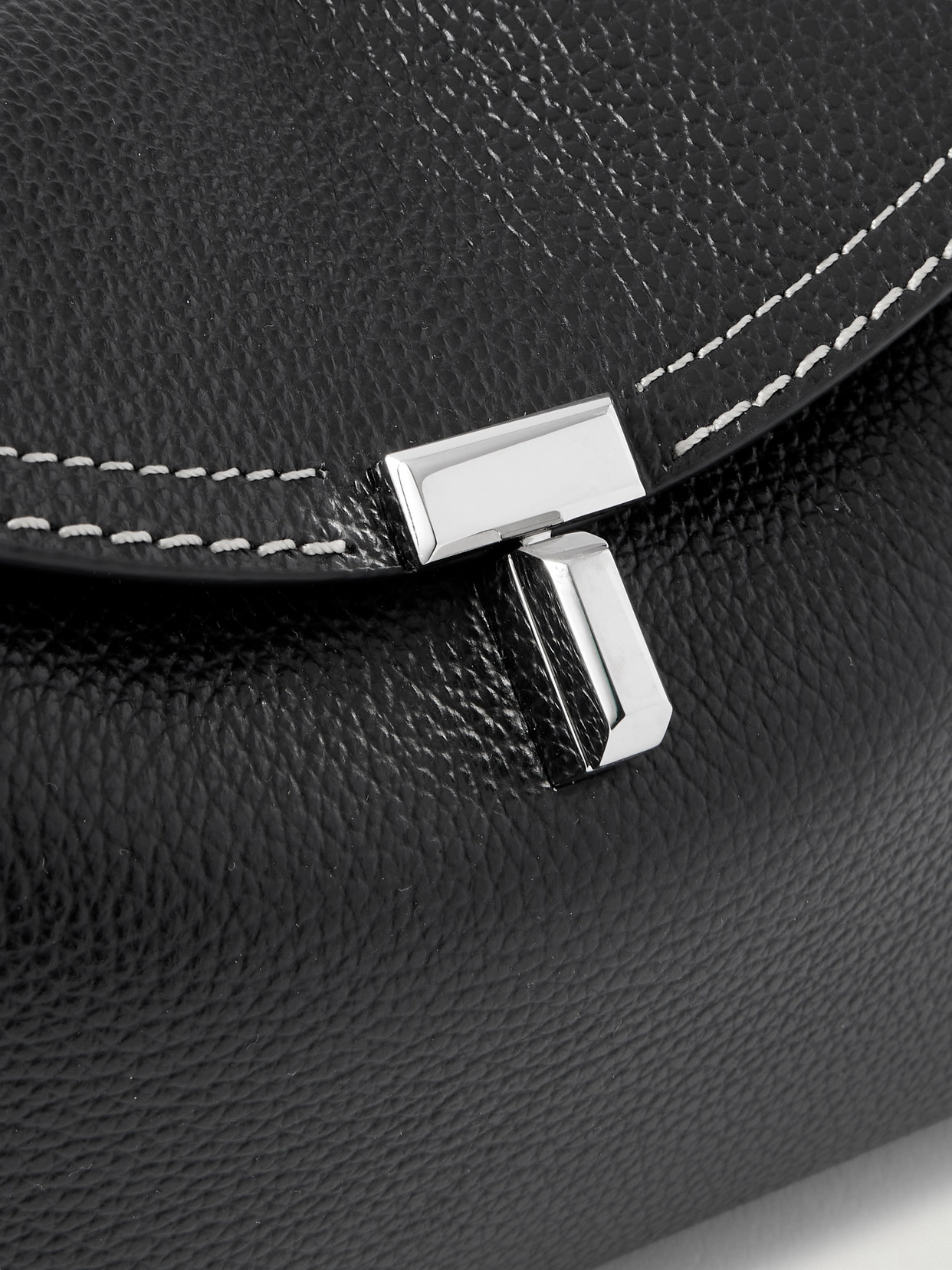 Totême T-lock Textured-leather Clutch In Black