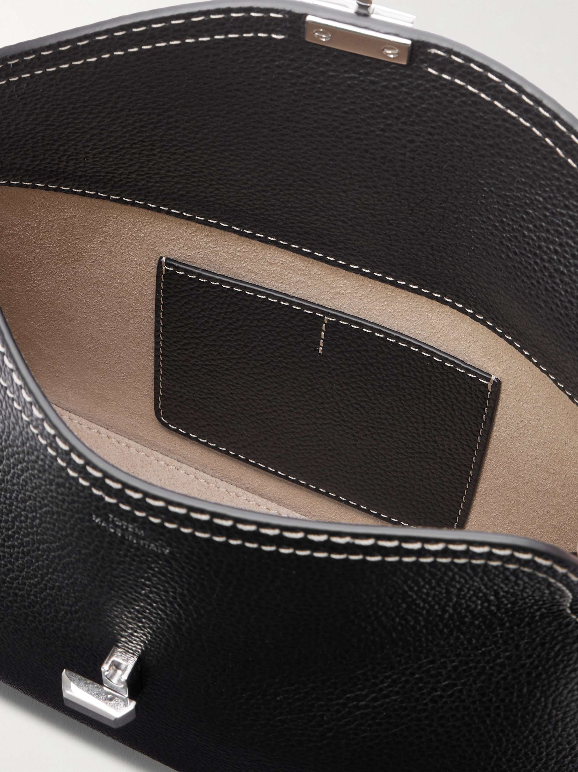 TOTEME T-Lock textured-leather clutch