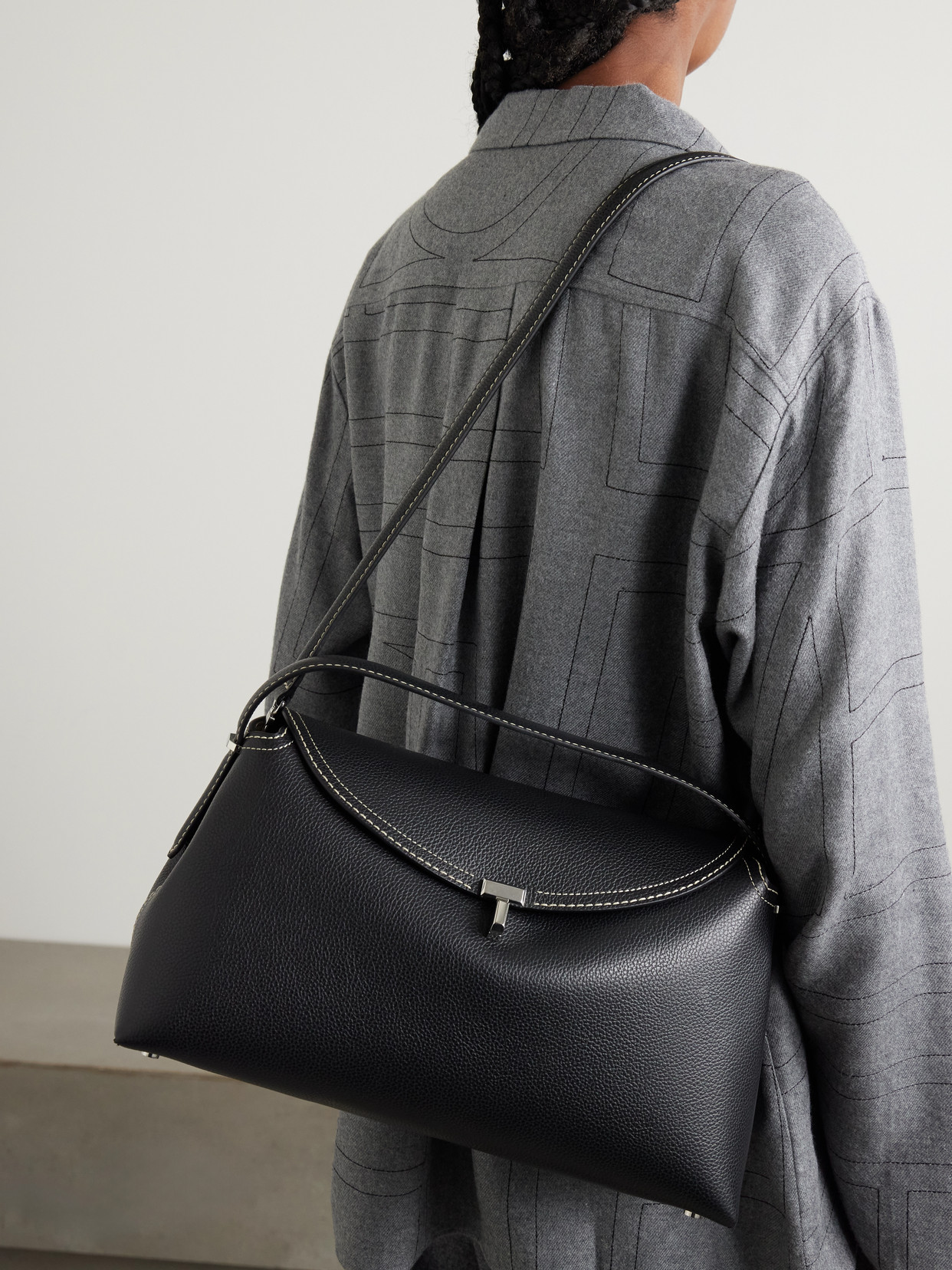 Totême T-lock Textured-leather Shoulder Bag In Black