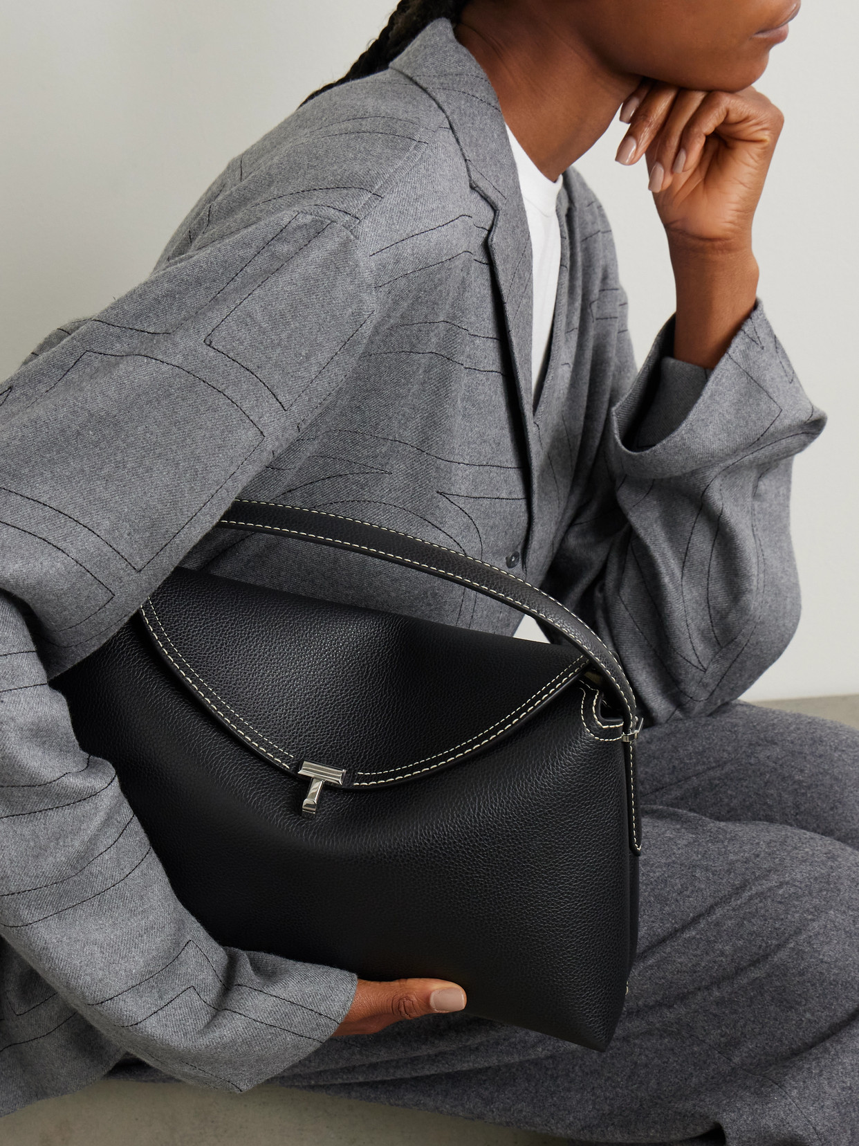 Totême T-lock Textured-leather Shoulder Bag In Black