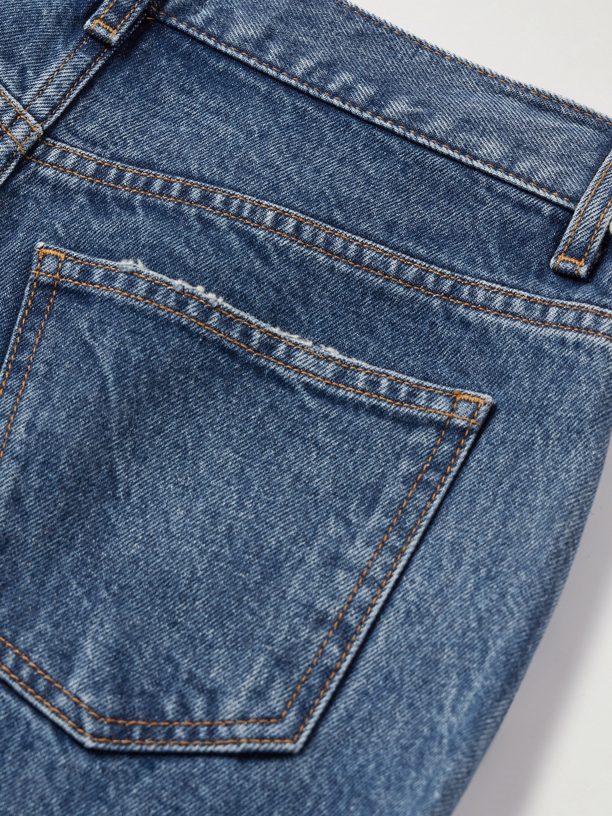 Khaite Kerrie Distressed Low-rise Straight-leg Jeans In Blue