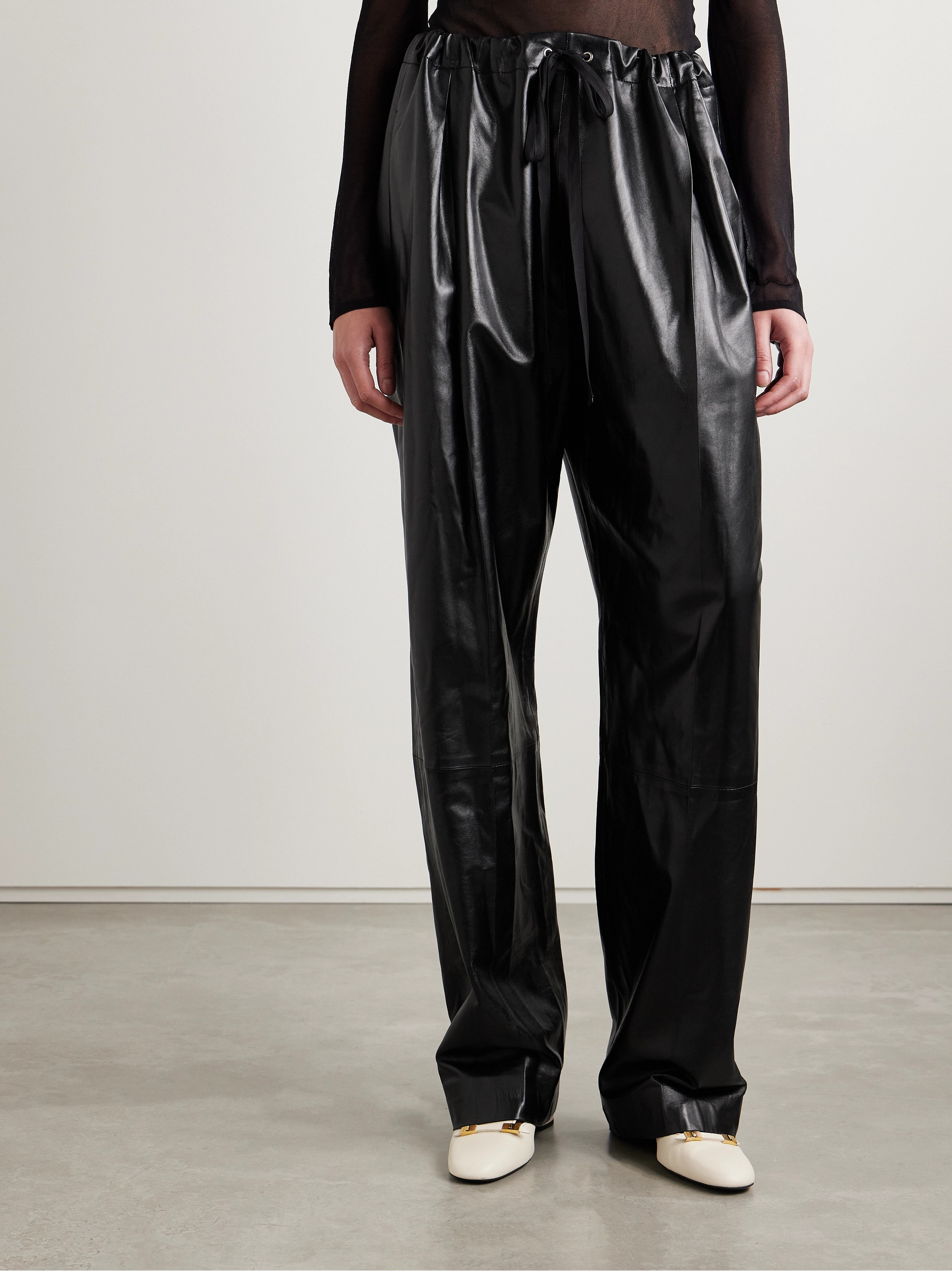 KHAITE Trenton pleated leather pants