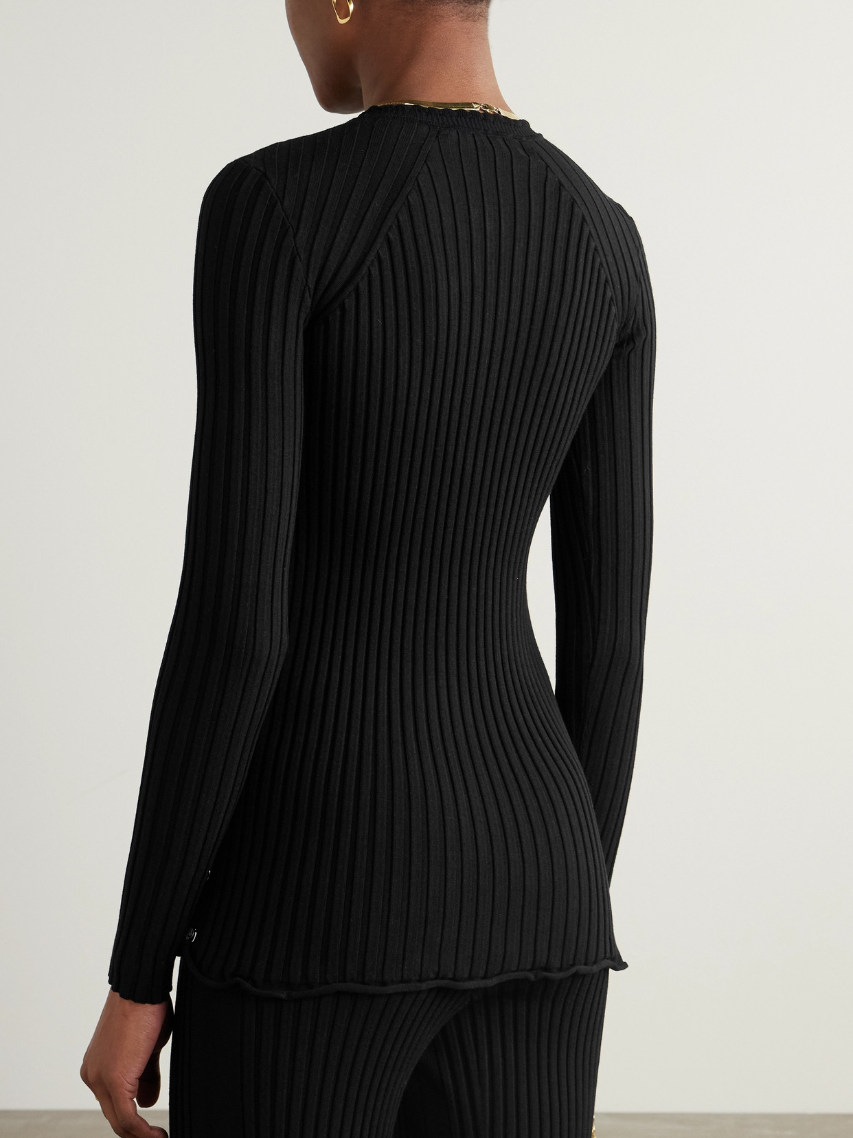 RABANNE RUFFLED RIBBED-KNIT SWEATER 