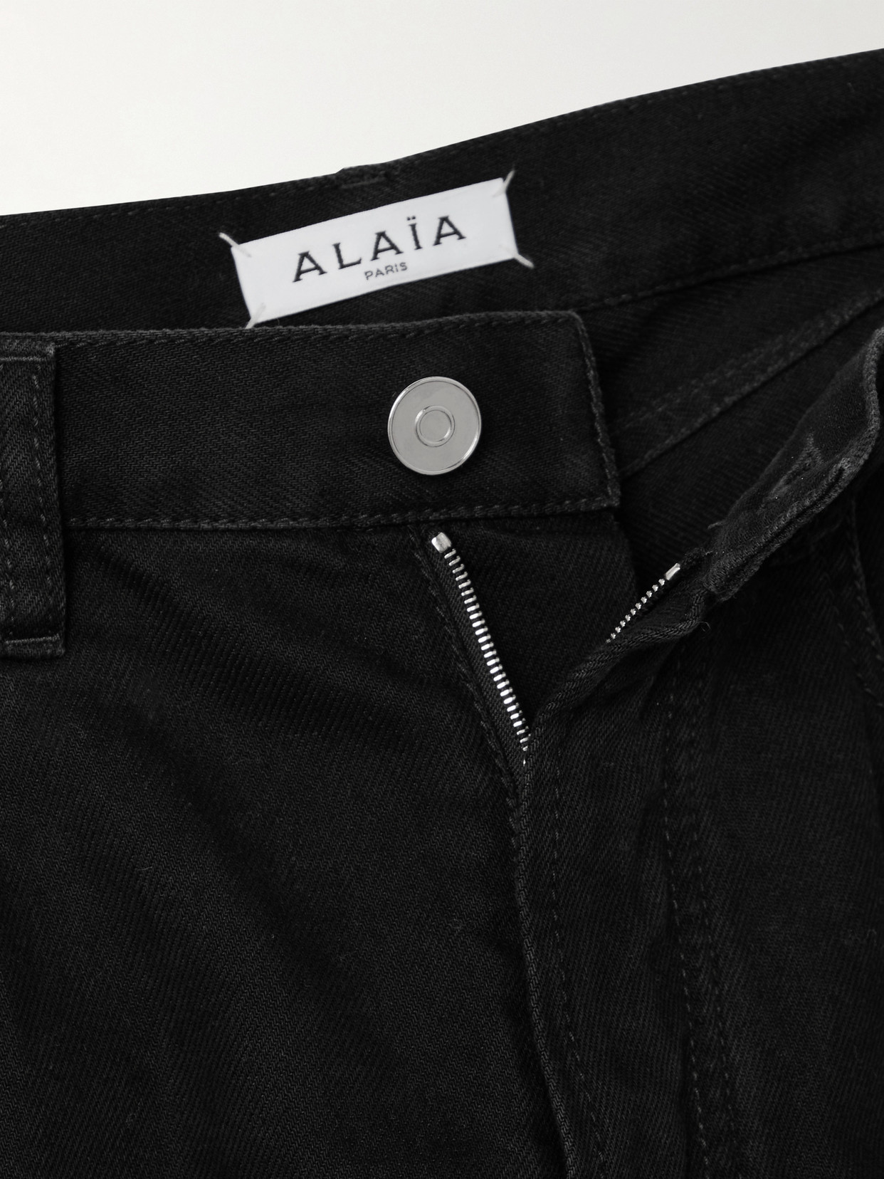 Alaïa Rounded Leg Denim Pants In Black