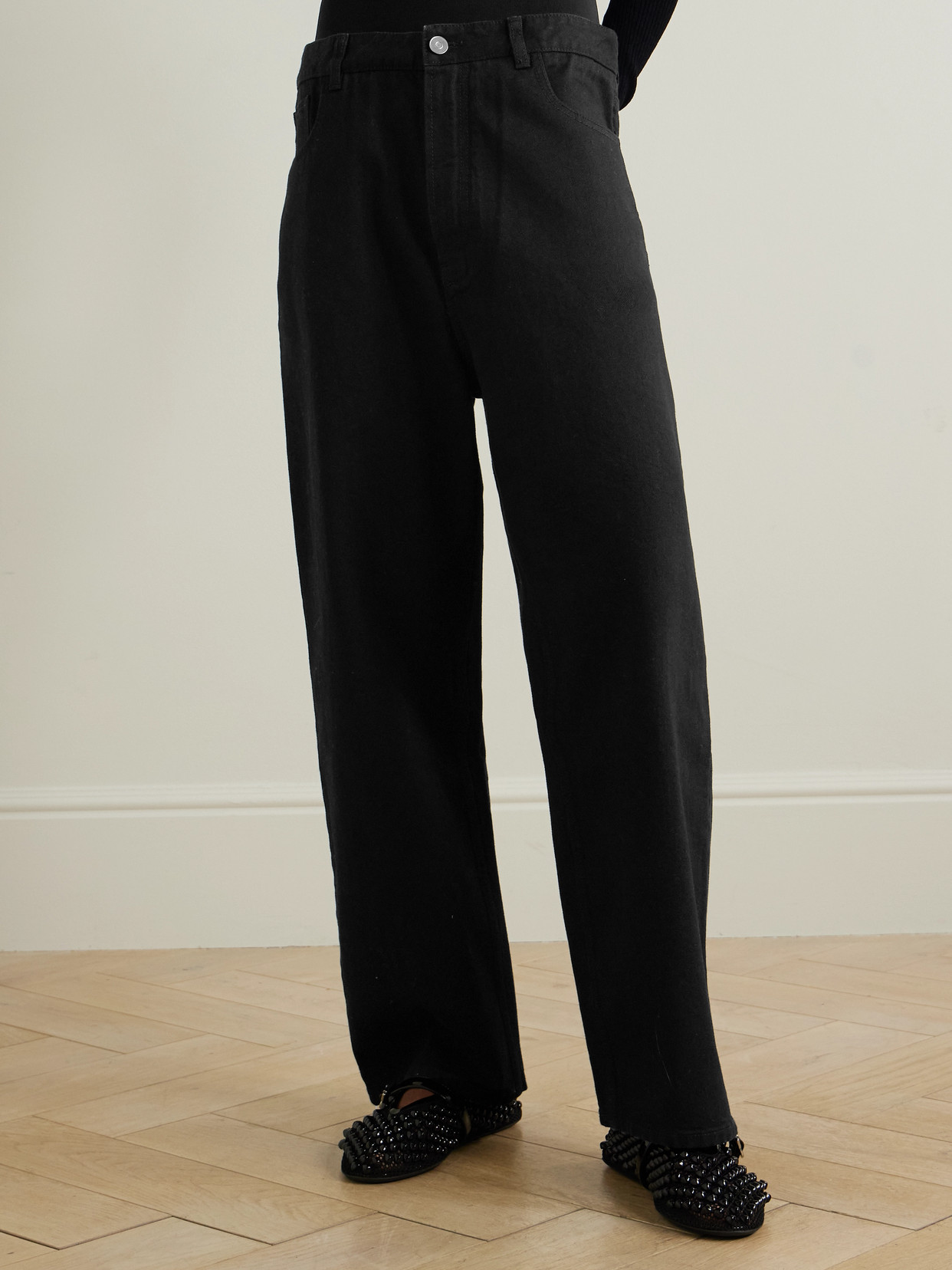 ALAÏA STRETCH KNIT-TRIMMED JEANS