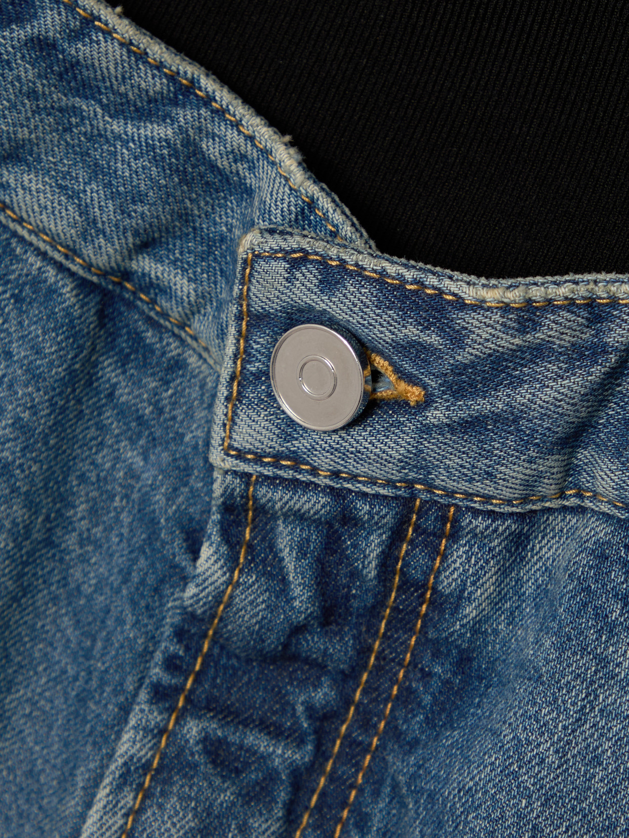 ALAÏA JERSEY-TRIMMED DENIM SHORTS