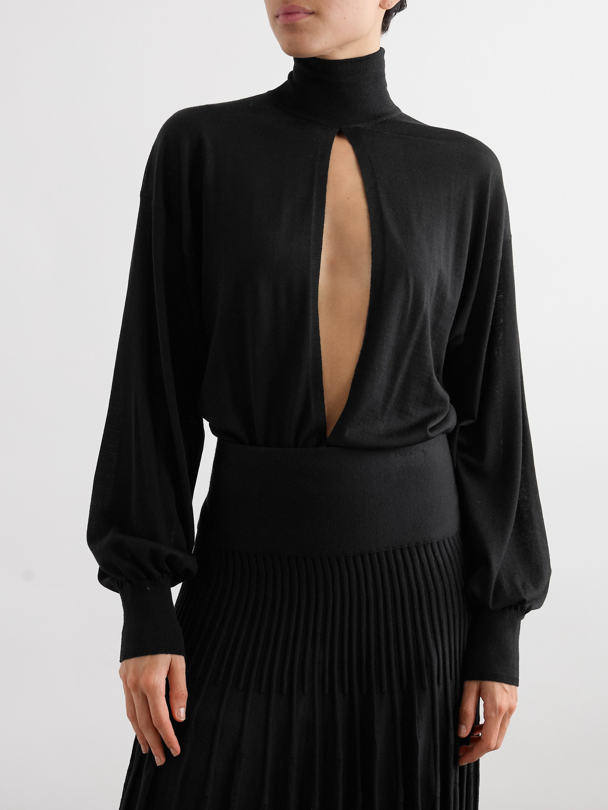 ALAÏA TURTLENECK CUTOUT WOOL-BLEND BODYSUIT