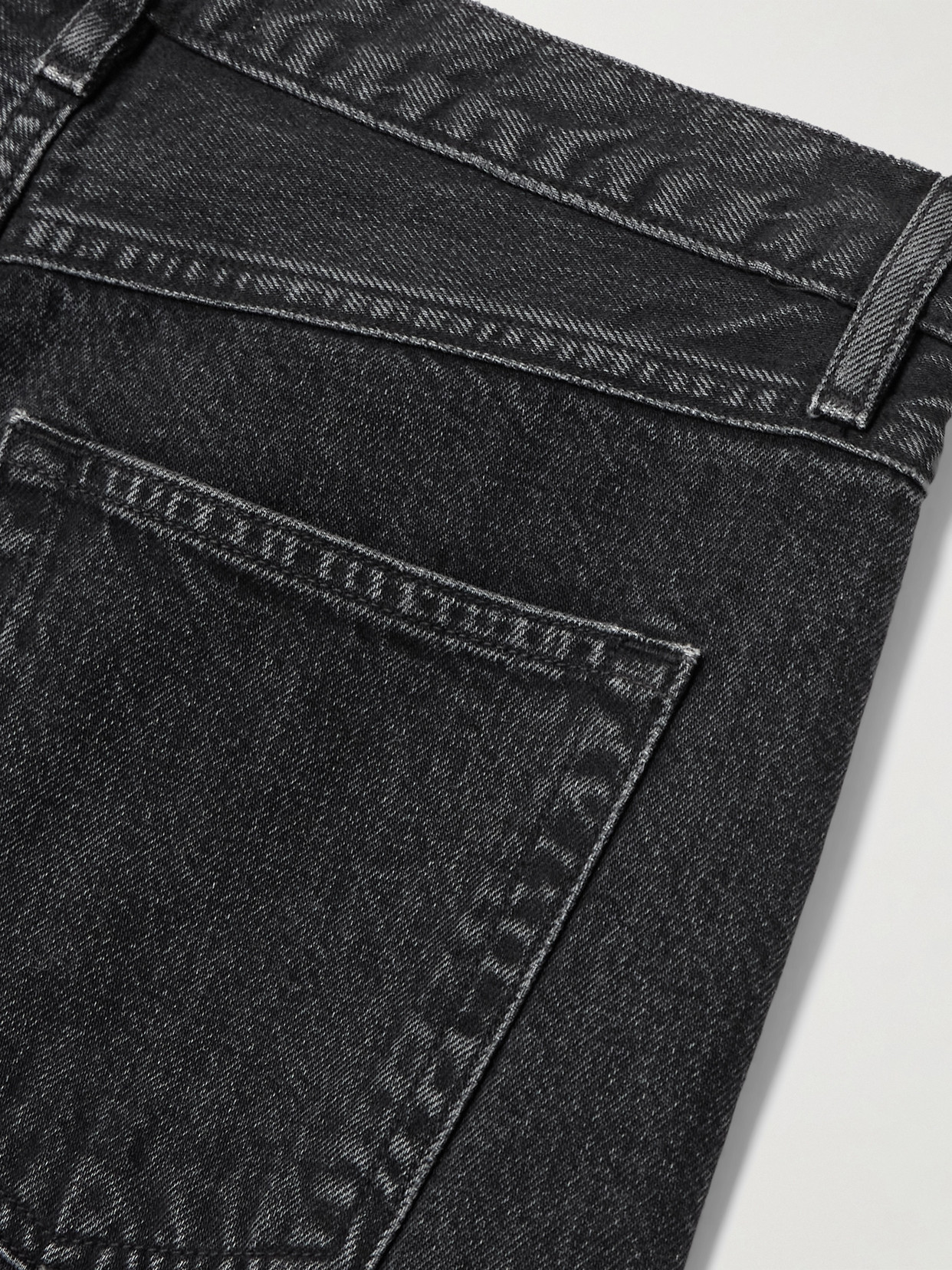 Frame The Narrow Peg High-rise Tapered Jeans In Black