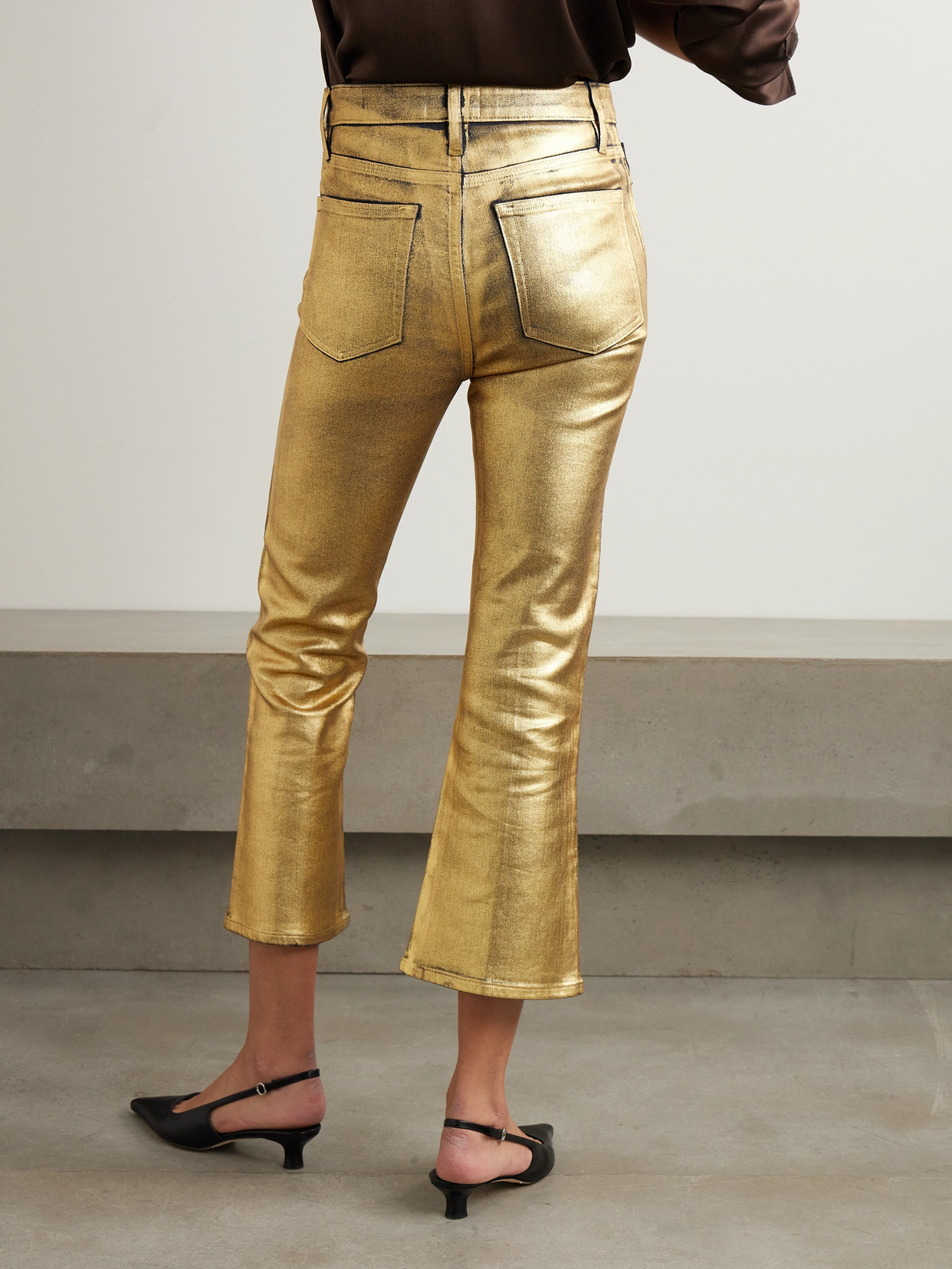 Frame Cropped Mini Bootcut Jeans In Gold Chrome In Gold