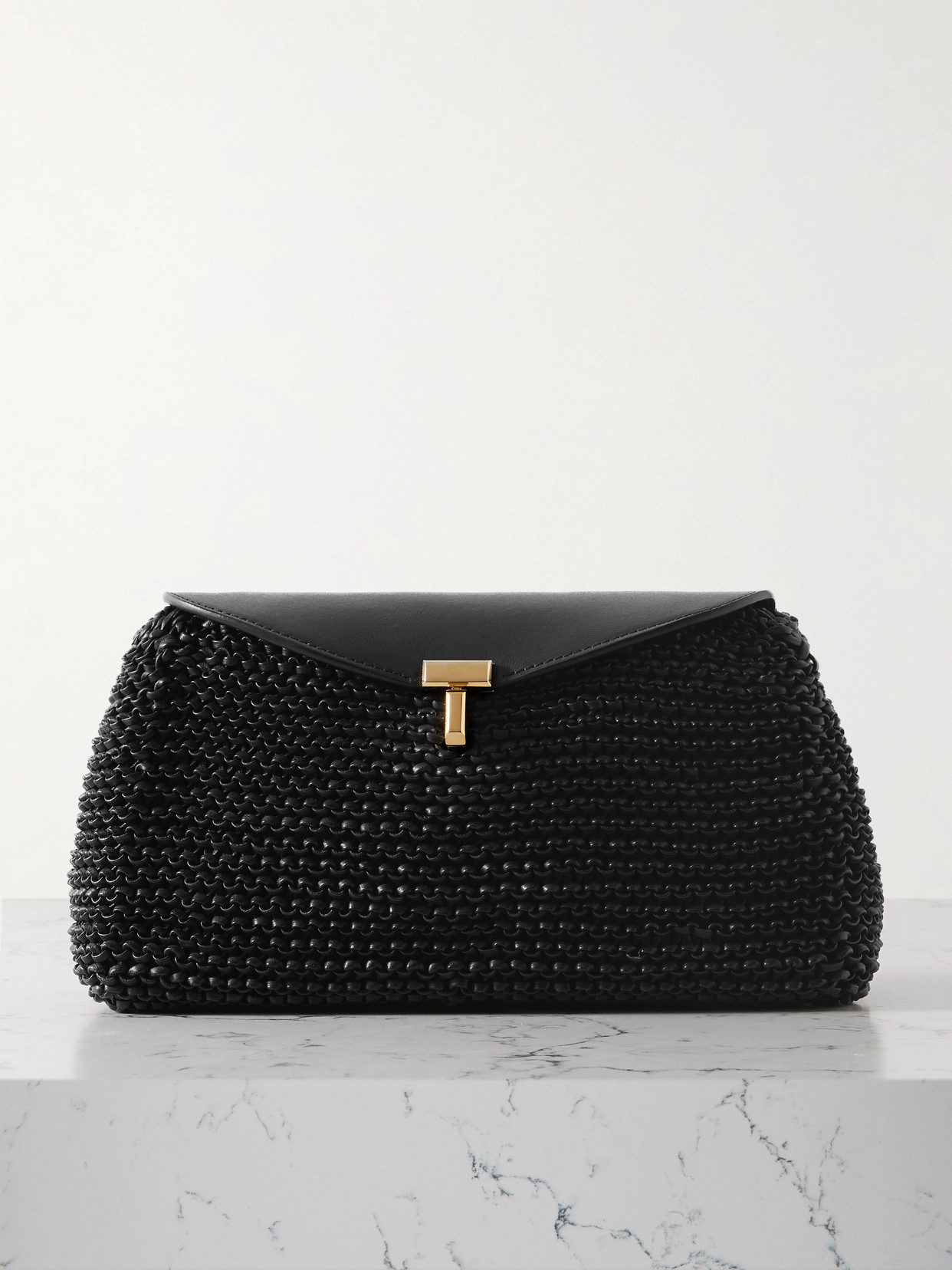 Totême T-lock Woven Leather Clutch In Black