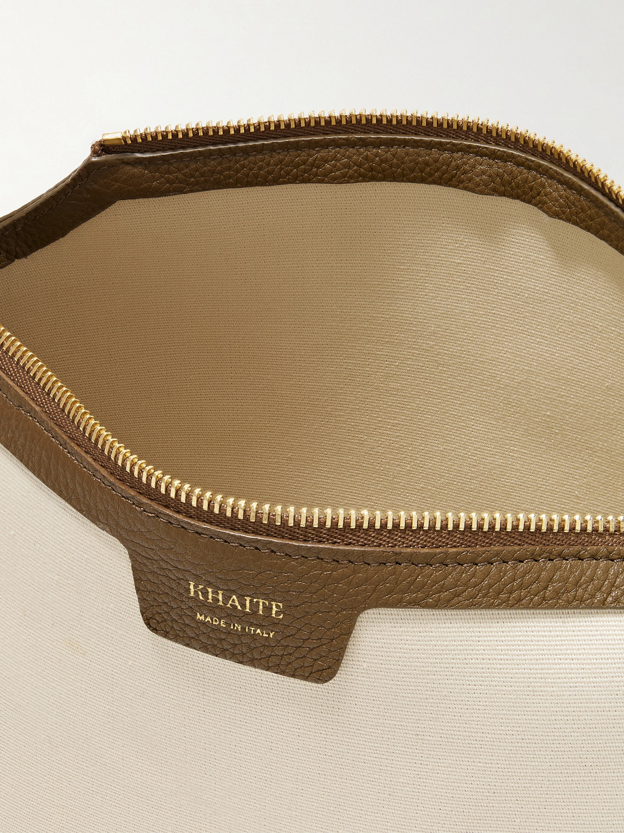 Shop Khaite Lina Medium Textured Leather-trimmed Canvas Shoulder Bag In Cream
