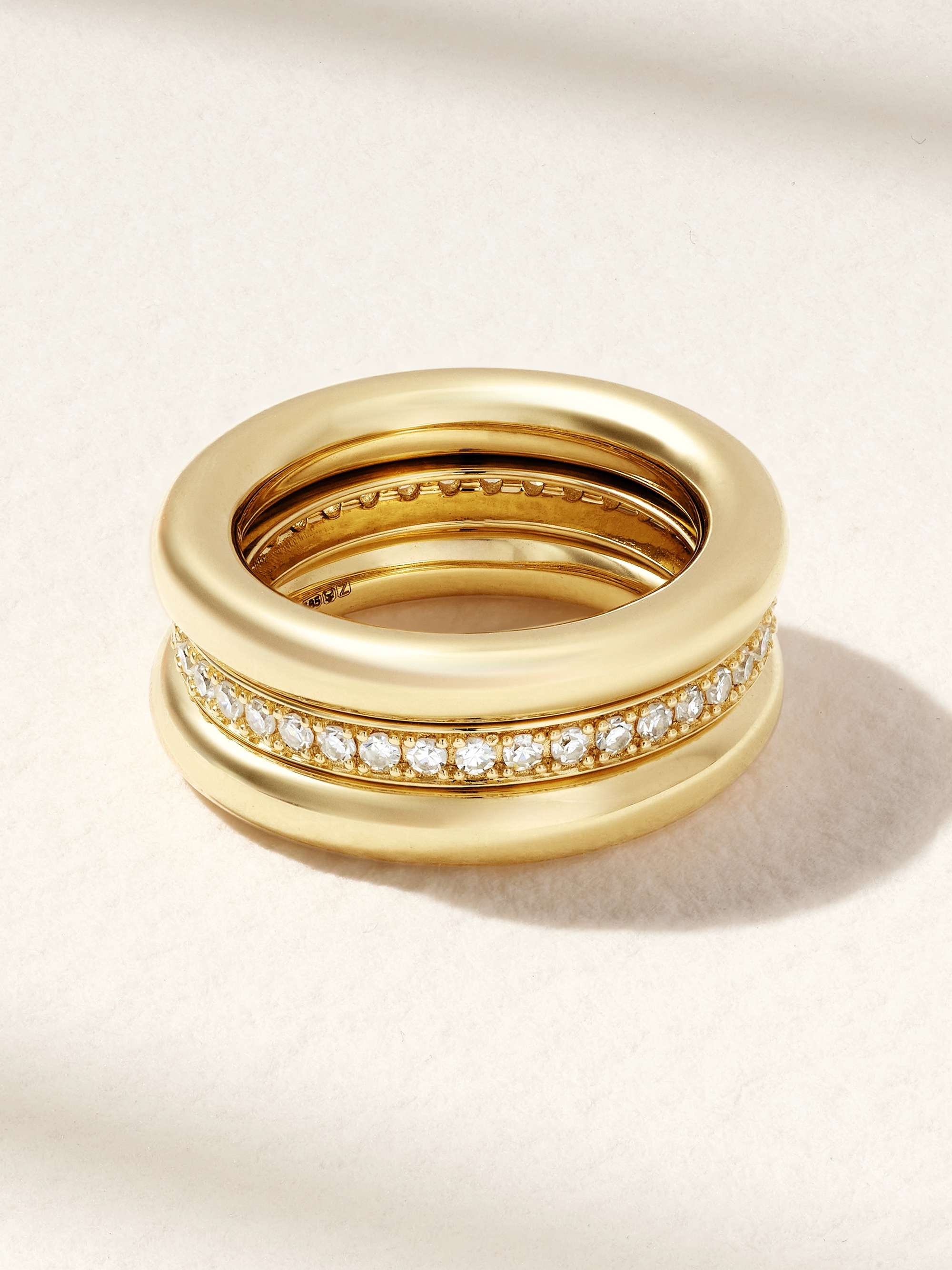 Set of three 14 karat recycled gold diamond pinky rings gold 44