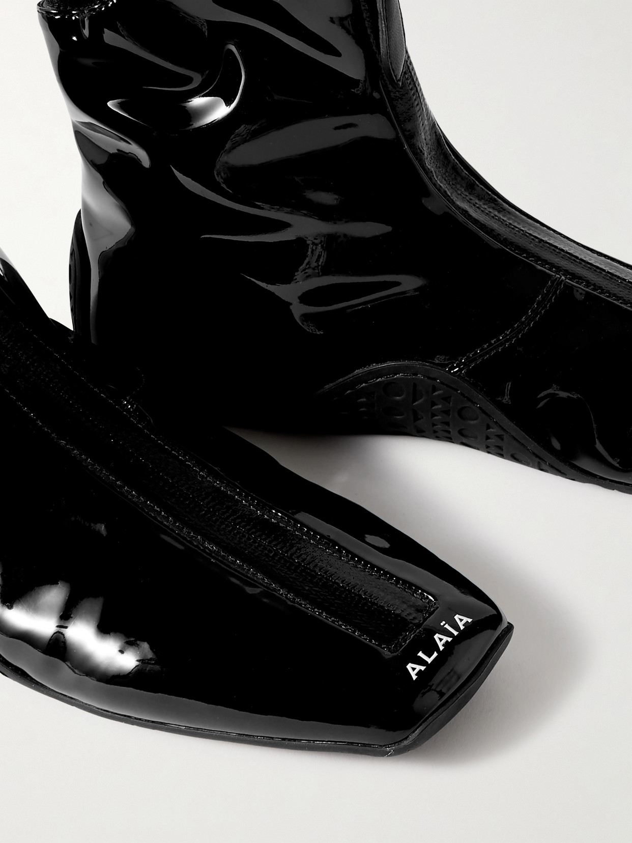 Alaïa Alaia Women La Sneaker In Stretch Patent Fabric In Black
