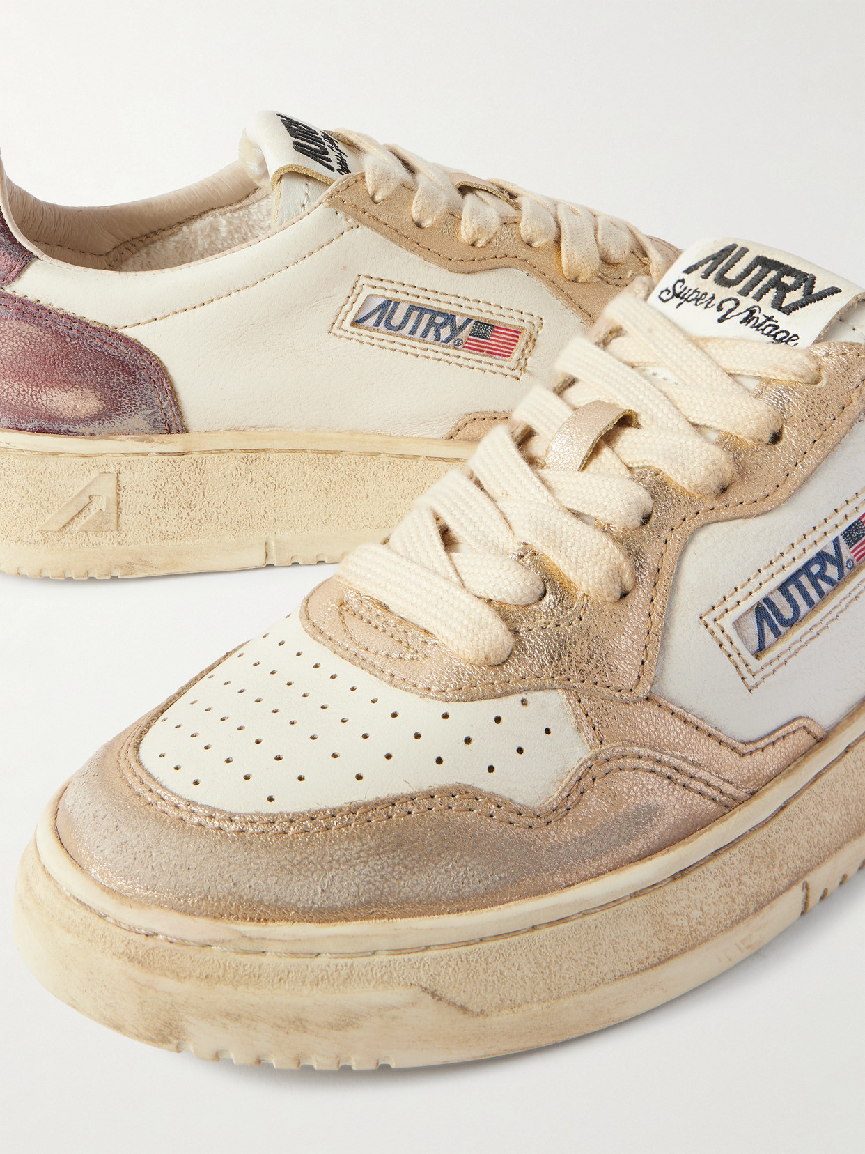 Autry Super Vintage Distressed Paneled Metallic Leather Sneakers In Gold