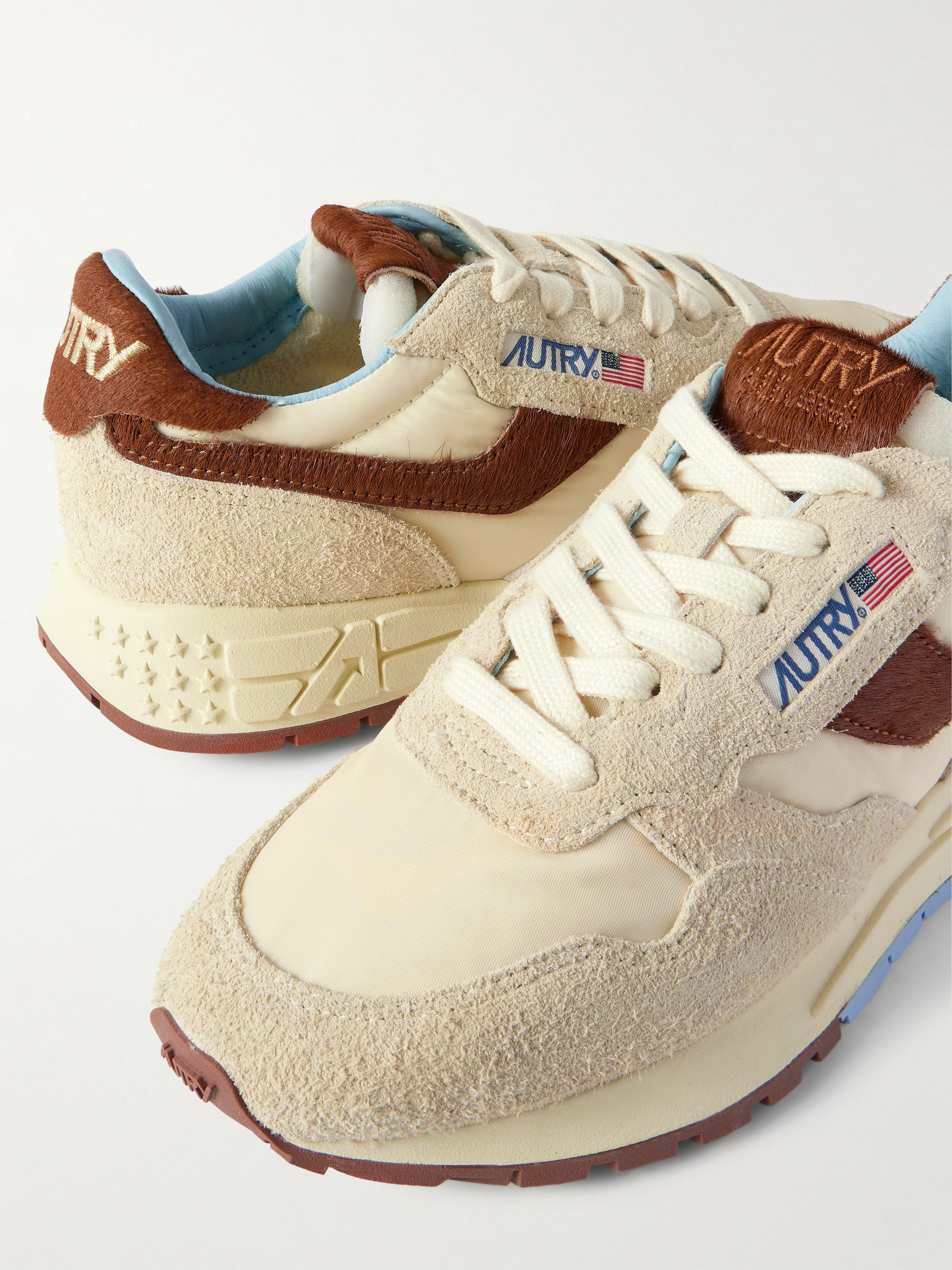 Autry Reelwind Low calf hair-trimmed suede and shell sneakers thumbnail