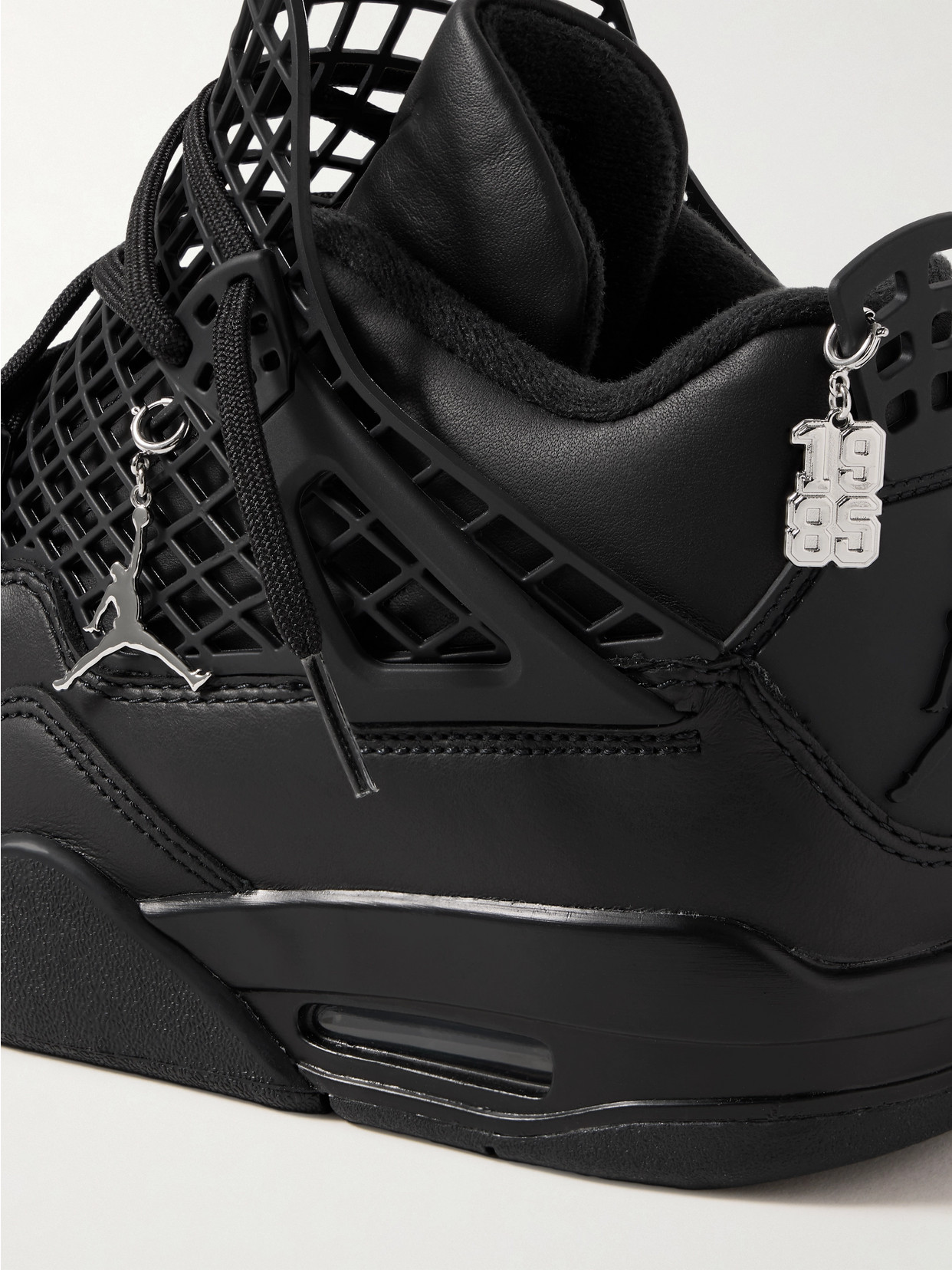 Nike Air Jordan 4 Net Cutout Rubber-trimmed Leather High-top Sneakers In Black