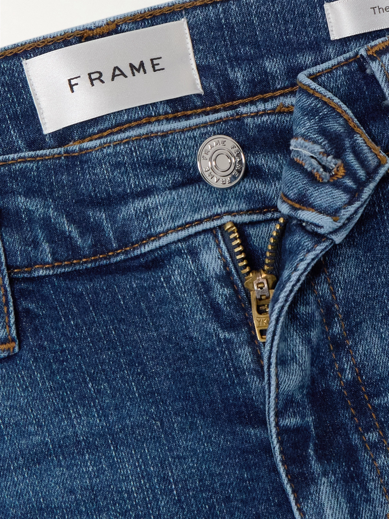 Shop Frame The Icon Flared Jeans In Blue