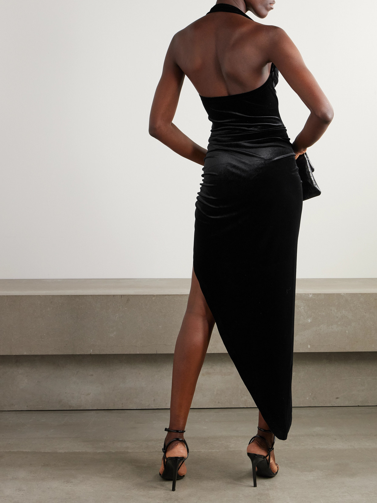 Shop Norma Kamali Cayla Asymmetric Ruched Velvet Halterneck Gown In Black