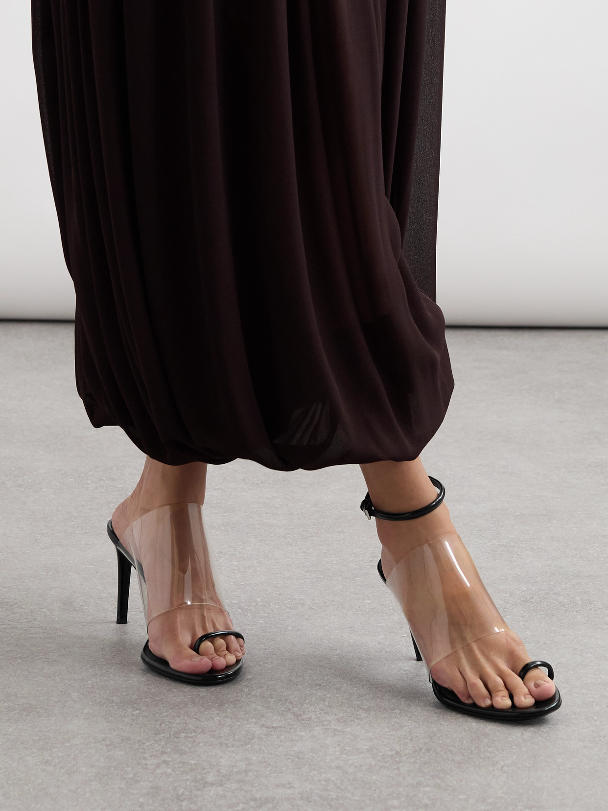 Shop Alaïa Asymmetric Patent-leather And Pvc Sandals In Black
