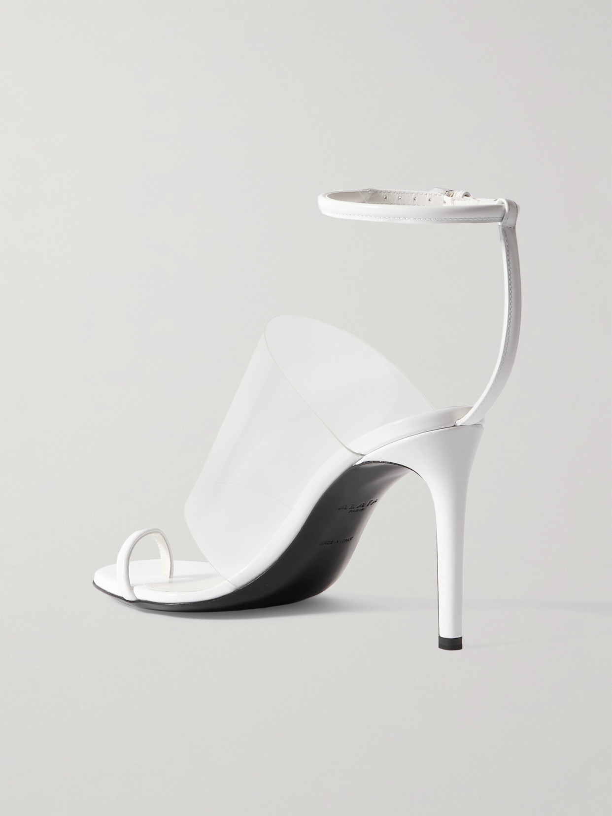 Alaïa Asymmetric Pu-leather Sandals In White