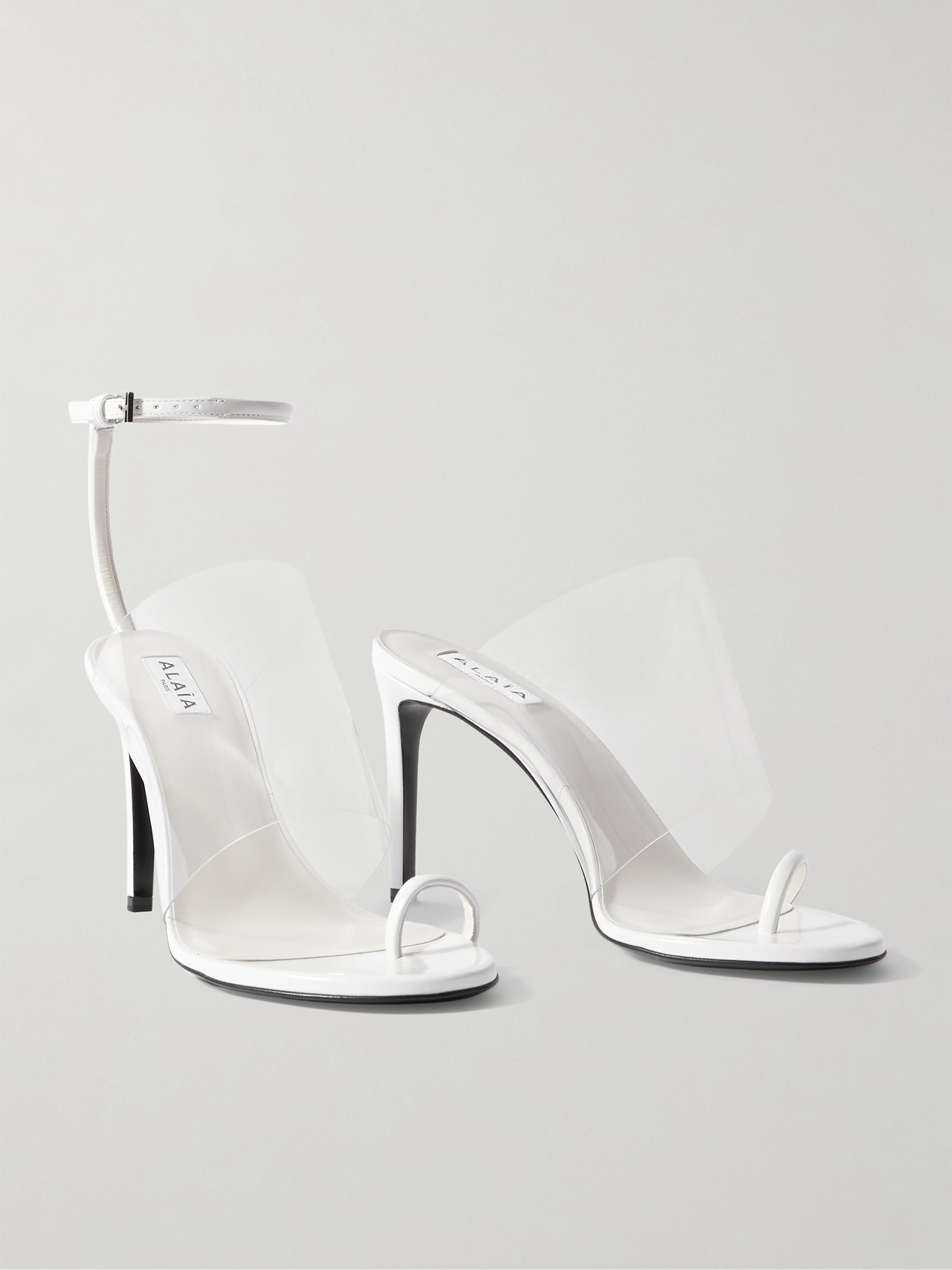 Alaïa - Asymmetric Patent-leather And Pvc Sandals - White