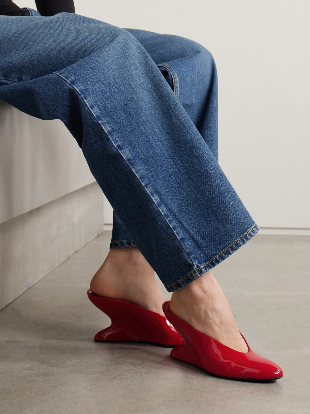 Shop Alaïa Patent-leather Wedge Mules In Red