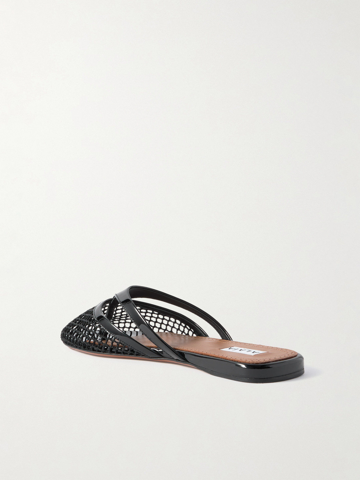 Shop Alaïa Patent-leather Trimmed Fishnet Mules In Black