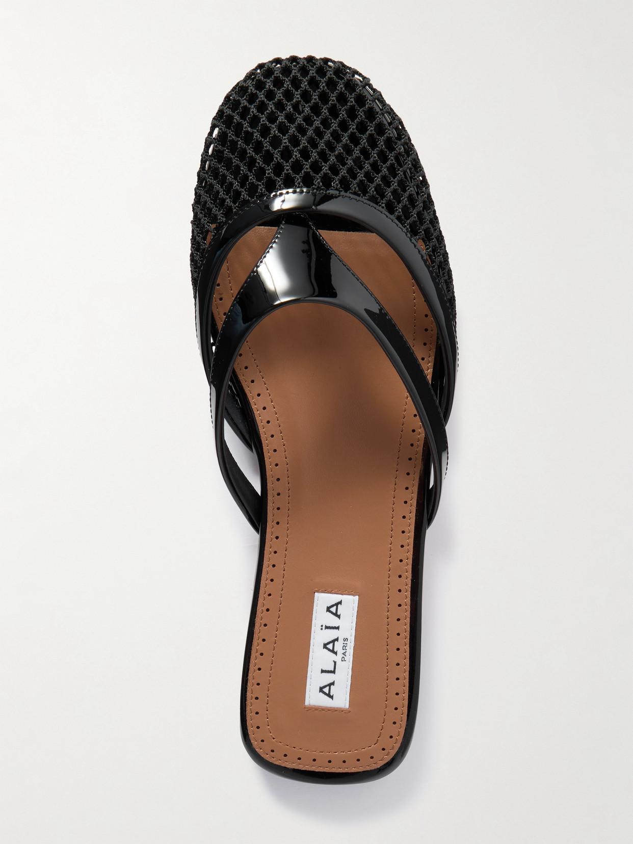 Shop Alaïa Patent-leather Trimmed Fishnet Mules In Black
