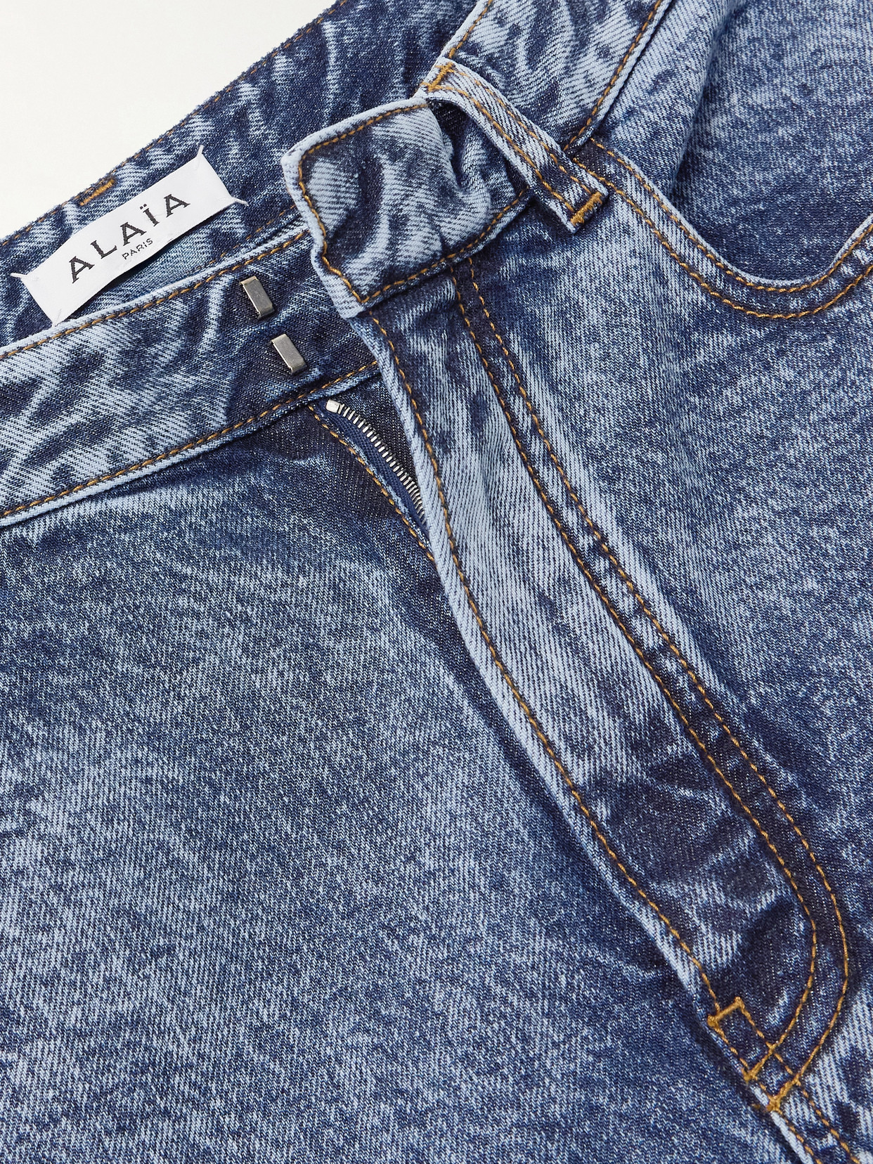Shop Alaïa Paneled Jeans In Blue