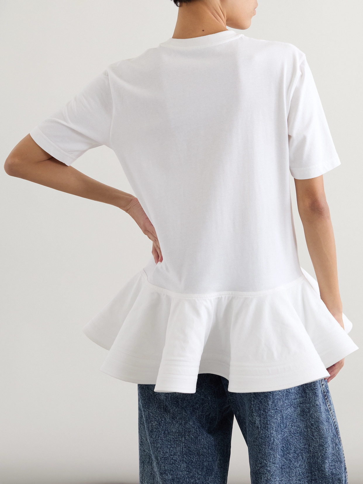 Alaïa Peplum T-shirt With Draped Hem Detail In White