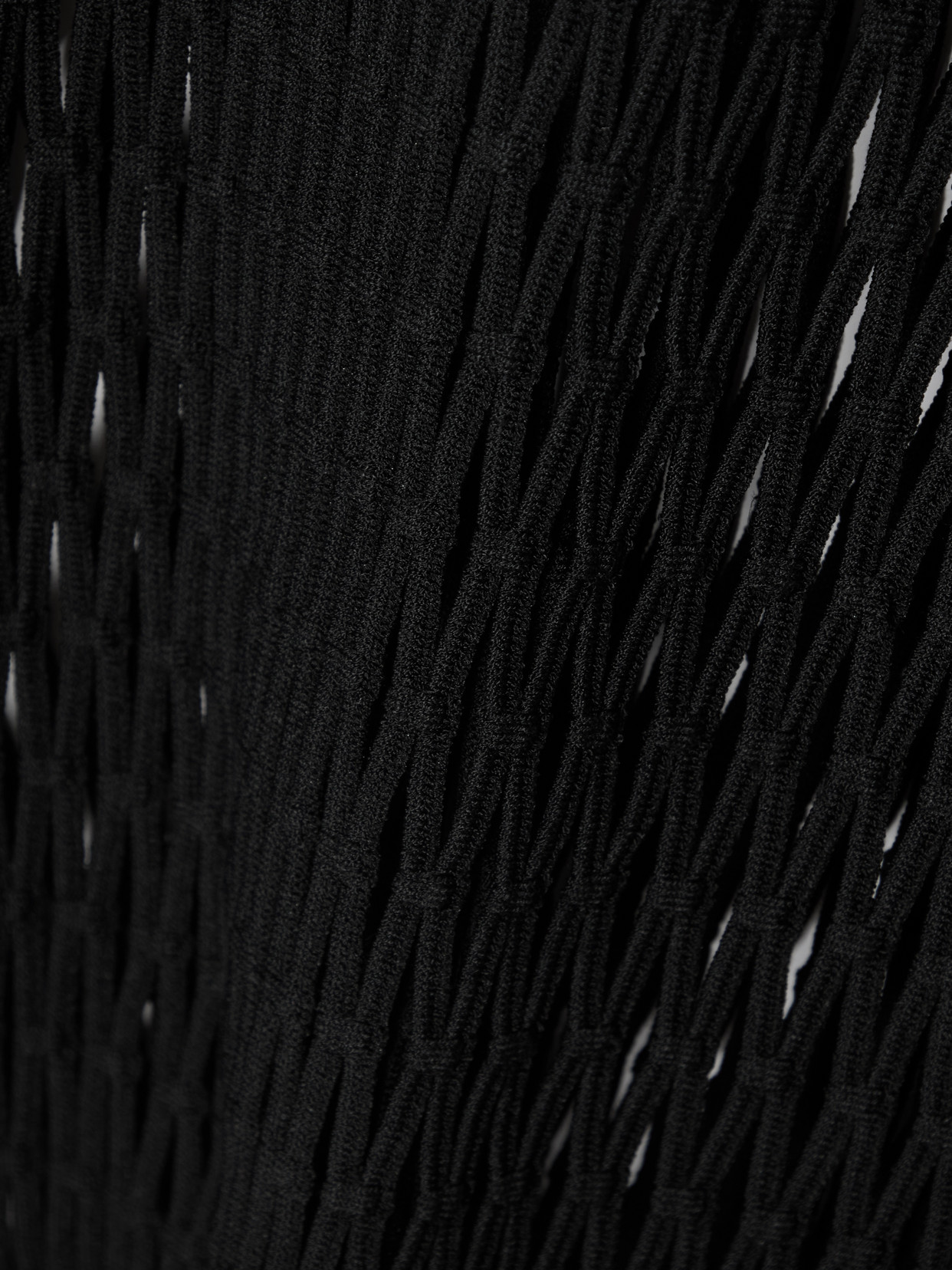 ALAÏA OVERSIZED OPEN-KNIT TURTLENECK SWEATER