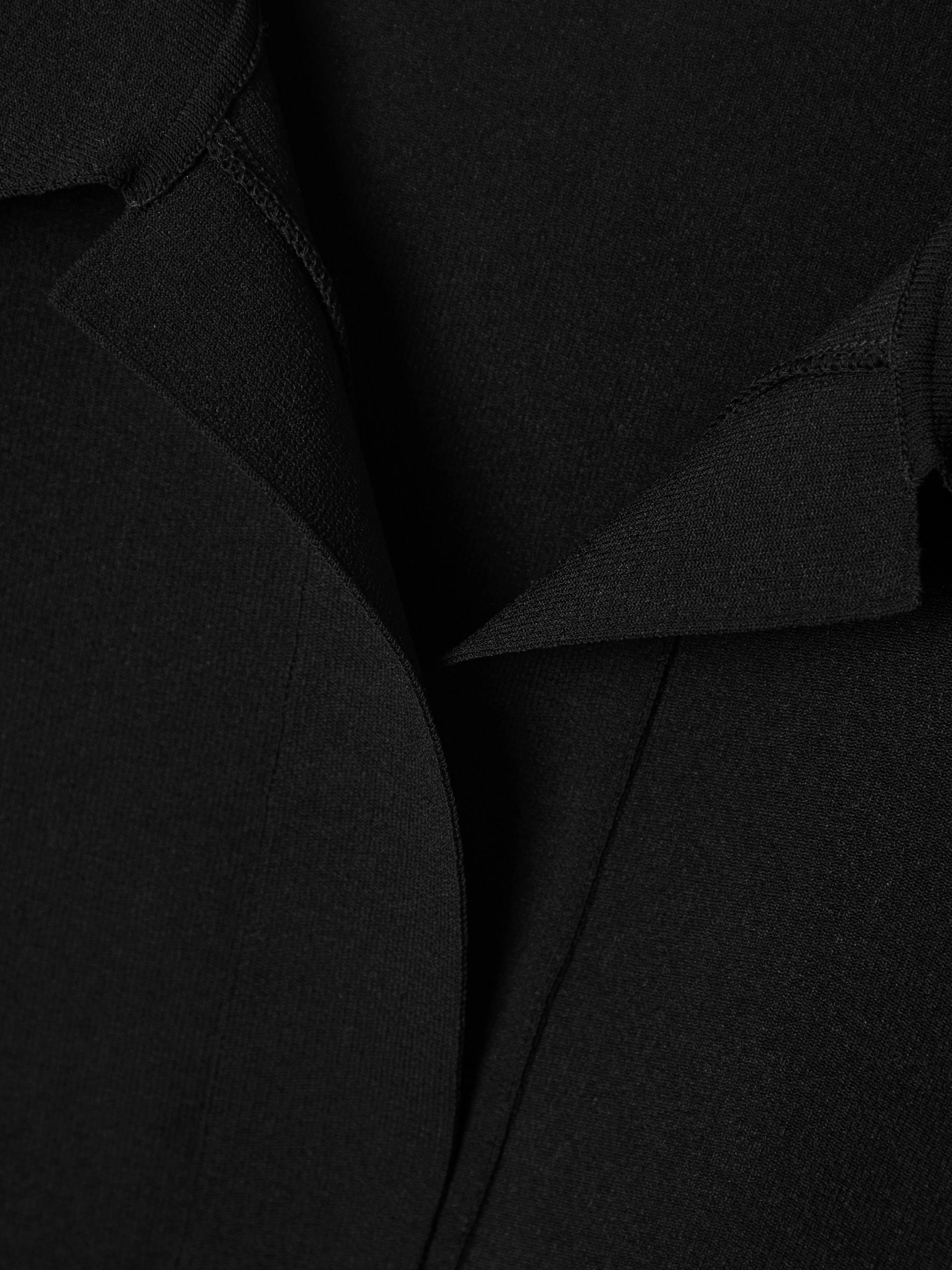 Alaïa Oversized cropped knitted polo shirt thumbnail