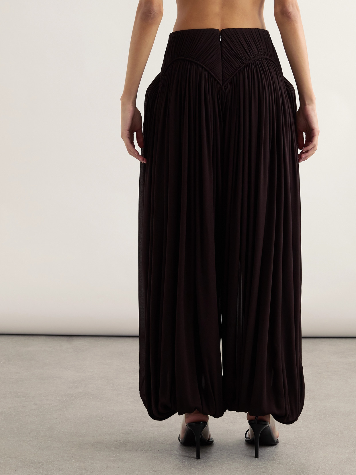Alaïa Pleated Crepe Tapered Pants In Brown