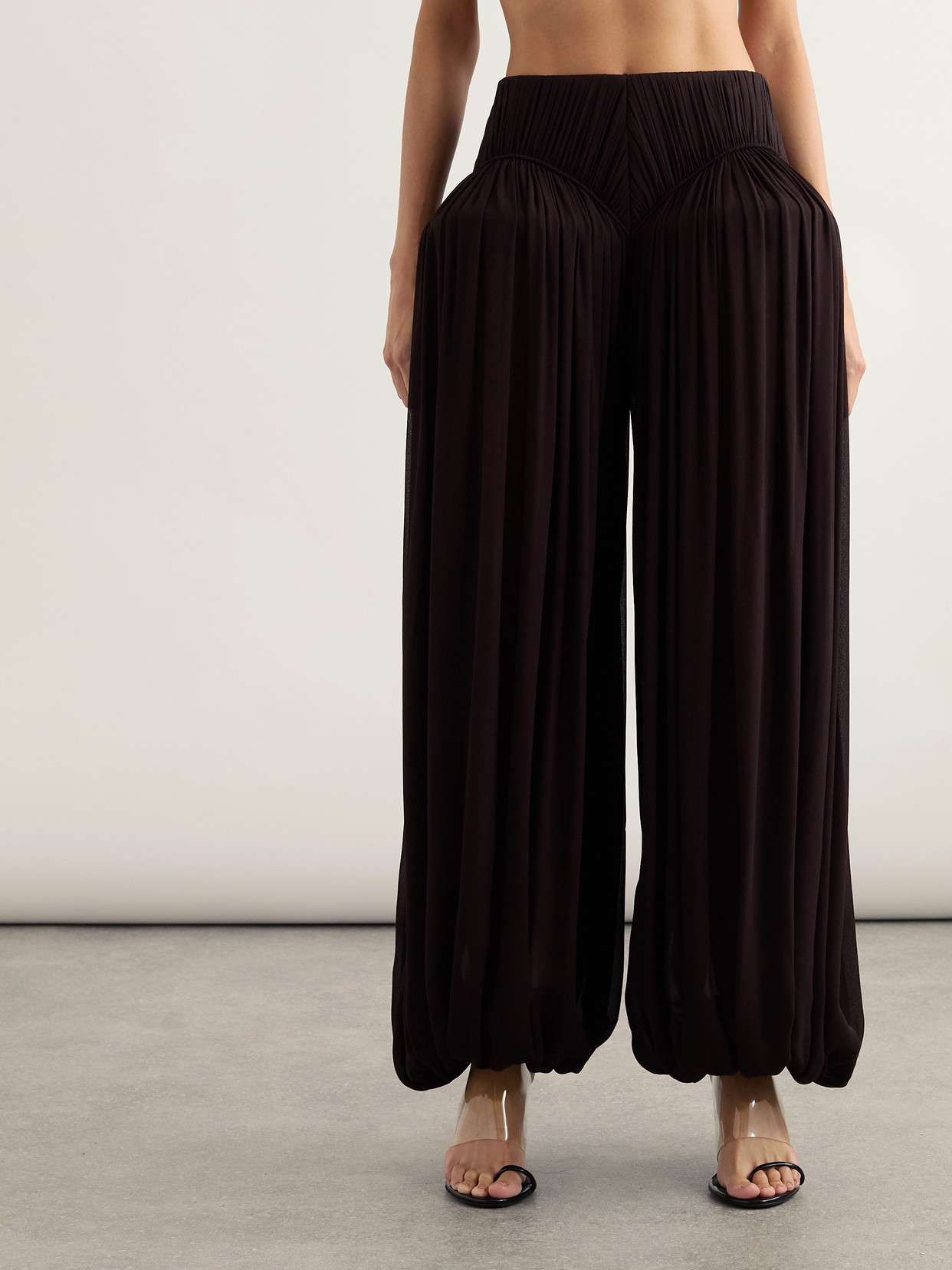 Alaïa Pleated Crepe Tapered Pants In Brown