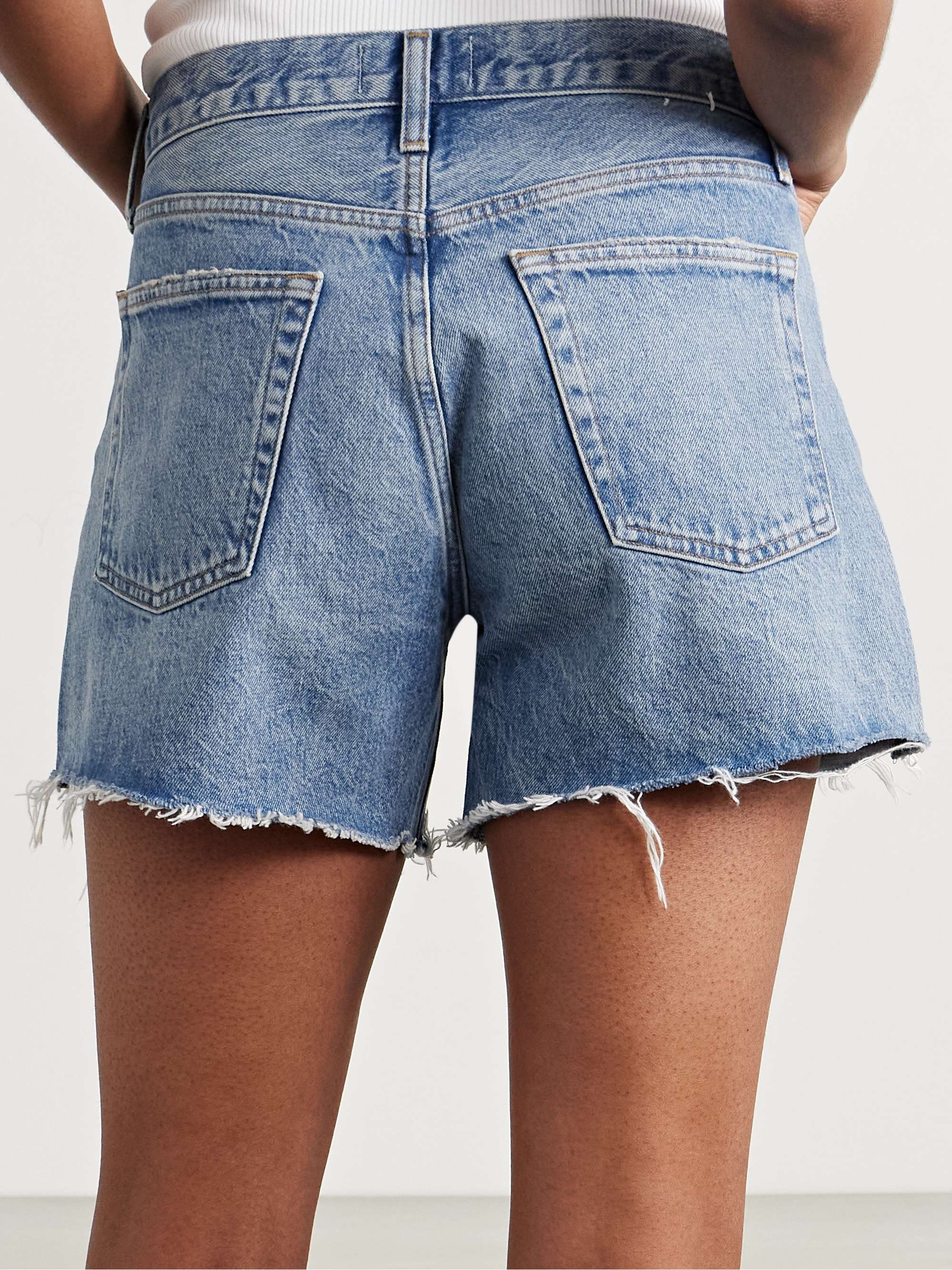 AGOLDE Long Parker distressed denim shorts