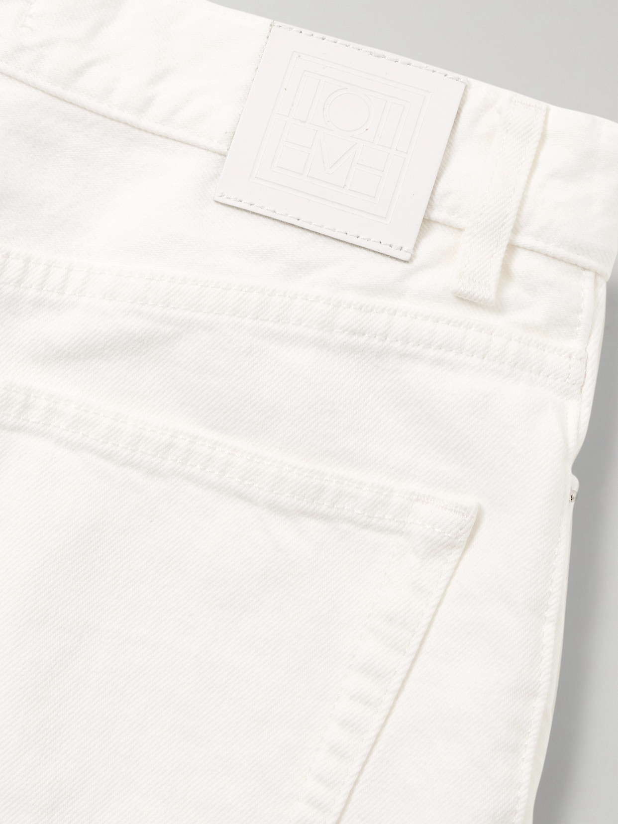 Totême Pleated High-rise Wide-leg Organic Jeans In White
