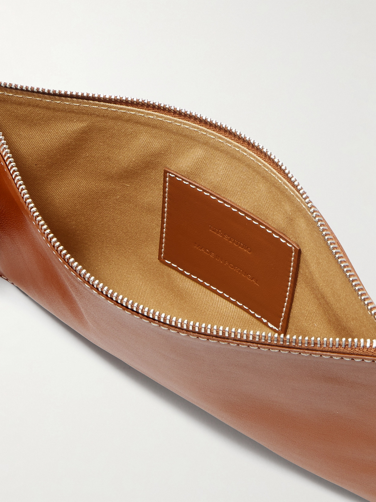 Lie Studio The Charlie Clutch Bag In Brown