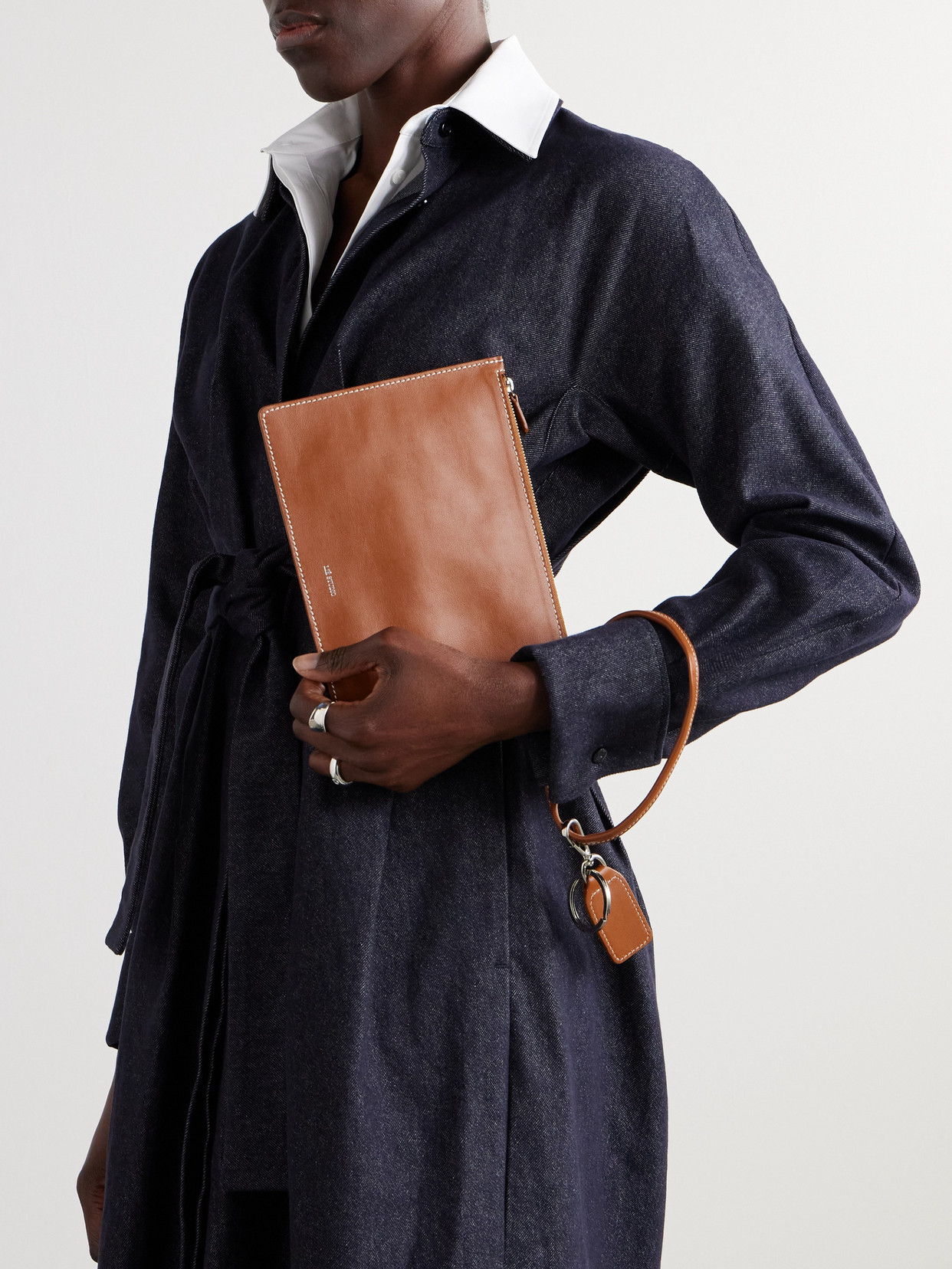 Lie Studio The Charlie Clutch Bag In Brown