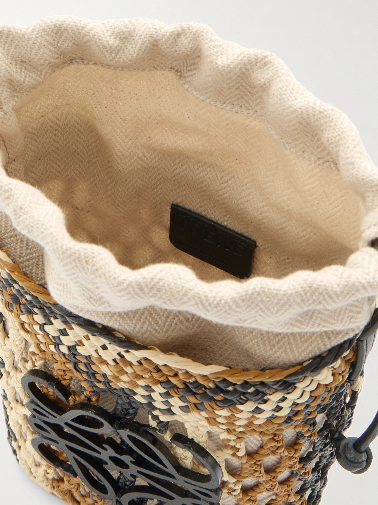 LOEWE + PAULA'S IBIZA ANAGRAM LEATHER-TRIMMED WOVEN RAFFIA BUCKET BAG