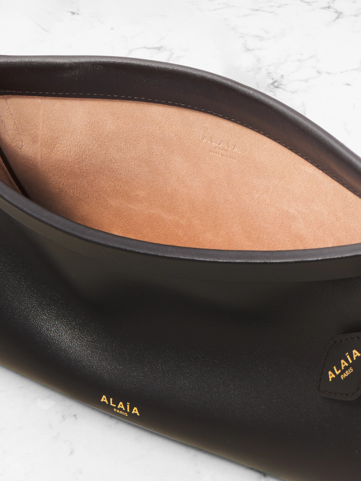 Shop Alaïa Click E/w Small Leather Shoulder Bag In Brown