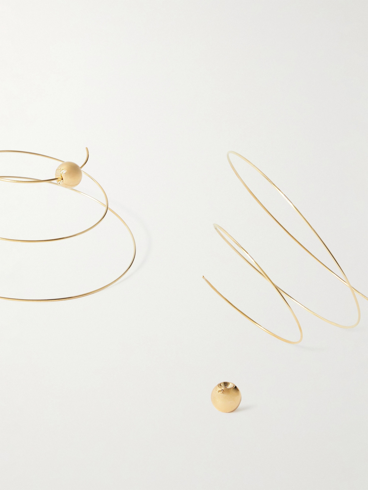 Alaïa Thin Spiral Gold-plated Earrings In Gold