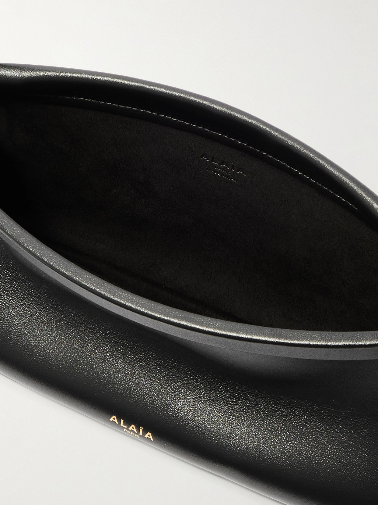 Shop Alaïa Click E/w Small Leather Shoulder Bag In Black