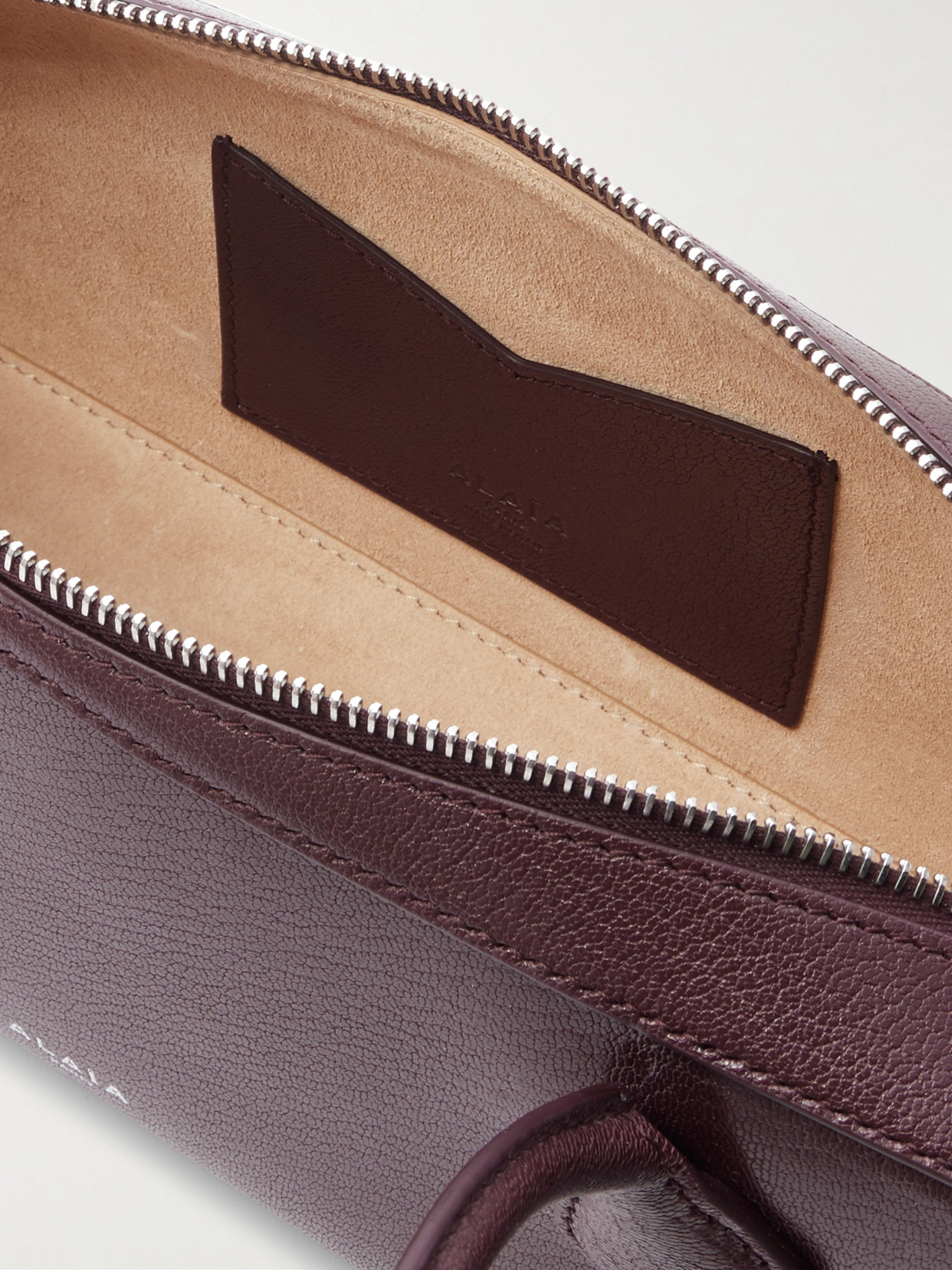 Alaïa Le Teckel Textured-leather Shoulder Bag In Burgundy