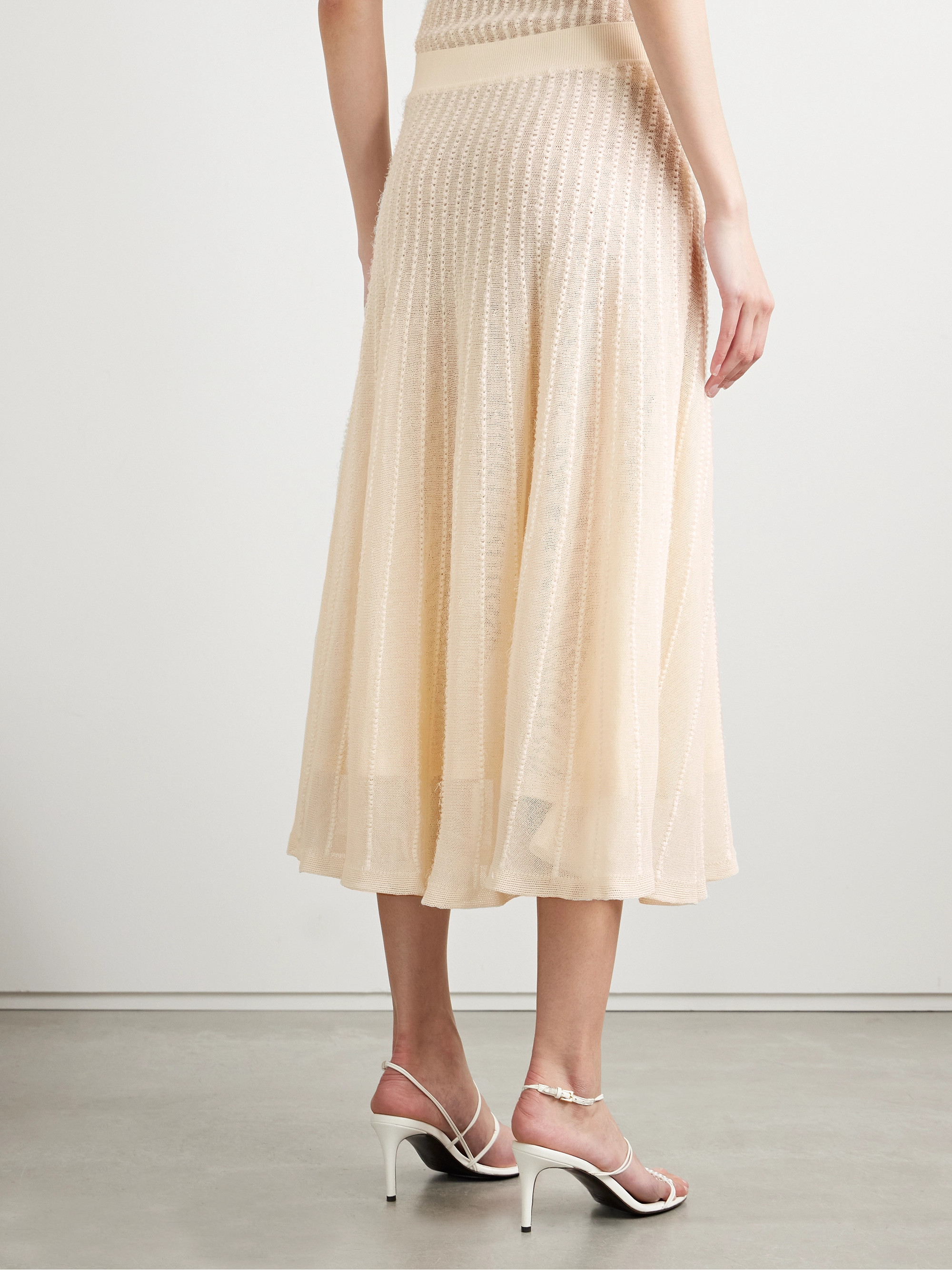 KHAITE Dawn pointelle-knit midi skirt