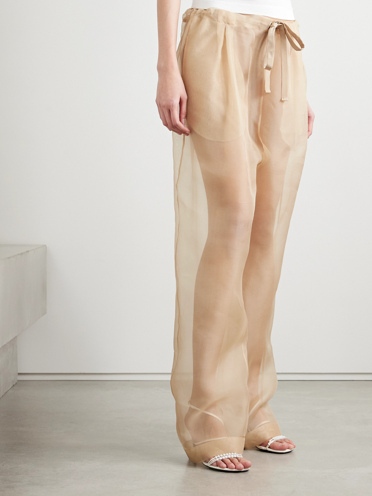 Khaite Trenton Pleated Silk-organza Tapered Pants In Neutrals