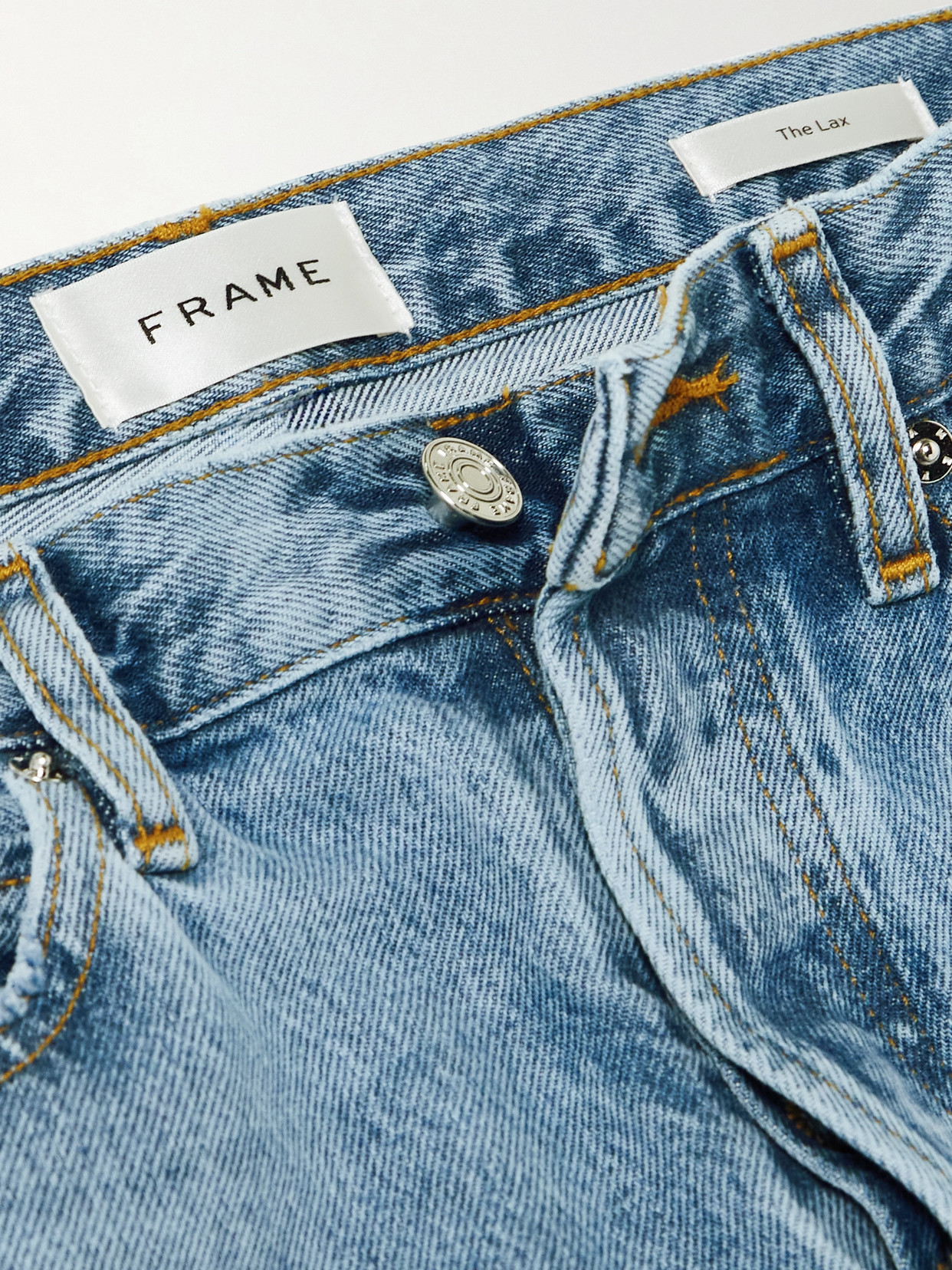 Shop Frame The Lax Distressed High-rise Flared Jeans In Blue