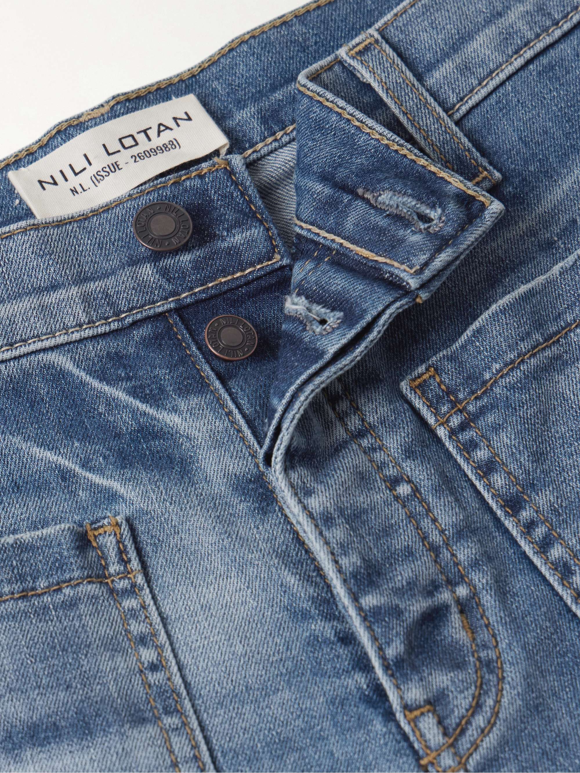 NILI LOTAN Florence distressed high-rise flared jeans