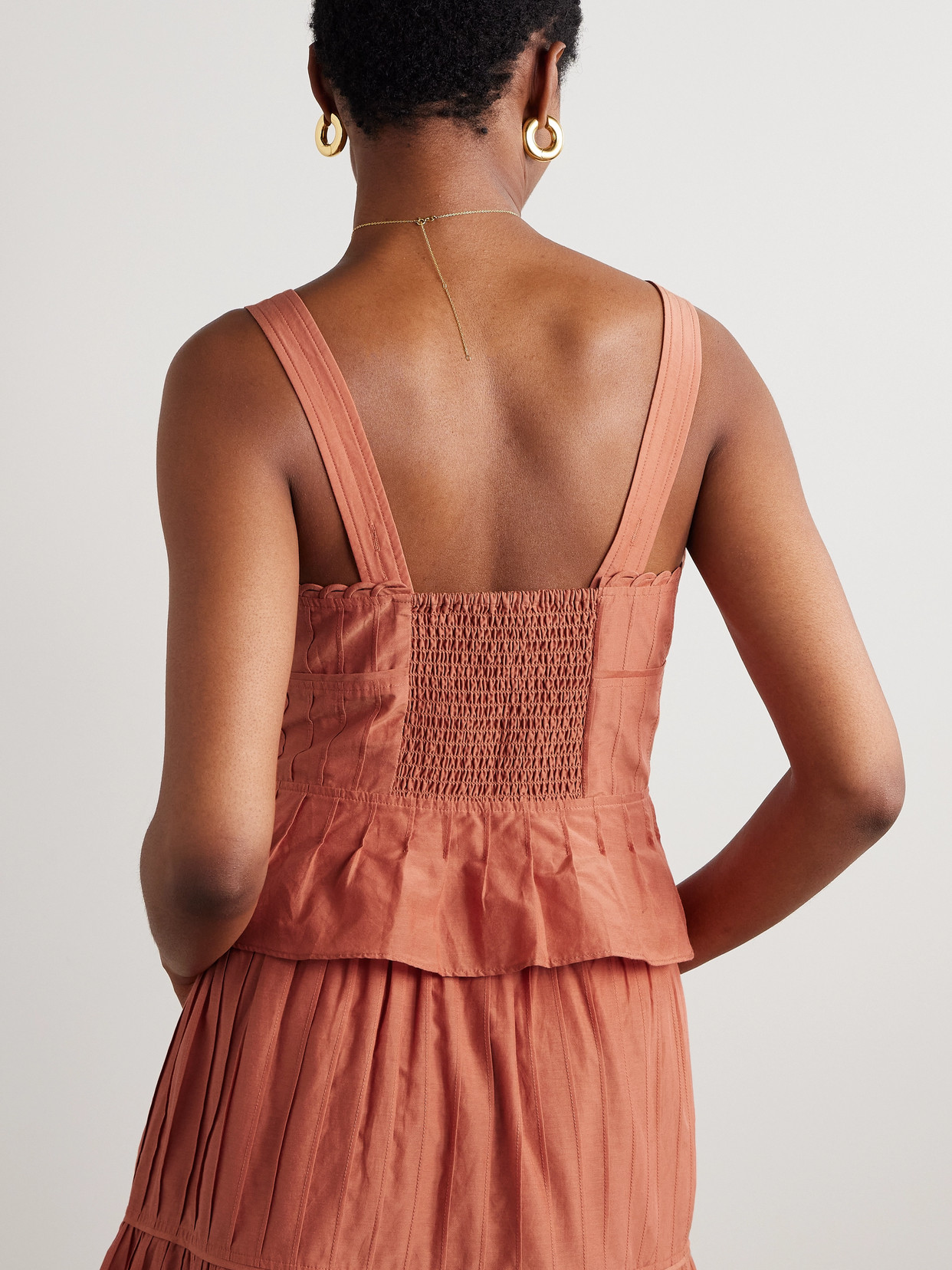 La Ligne Pintucked Cotton And Silk-blend Peplum Tank In Orange