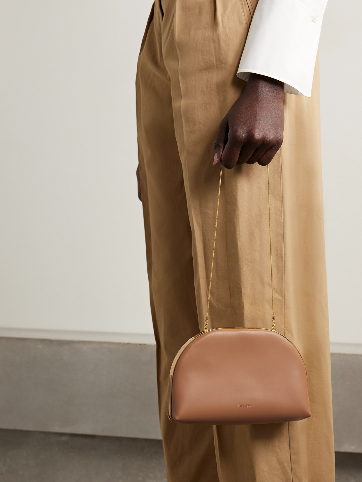 The Row Sylvia Leather Clutch In Brown