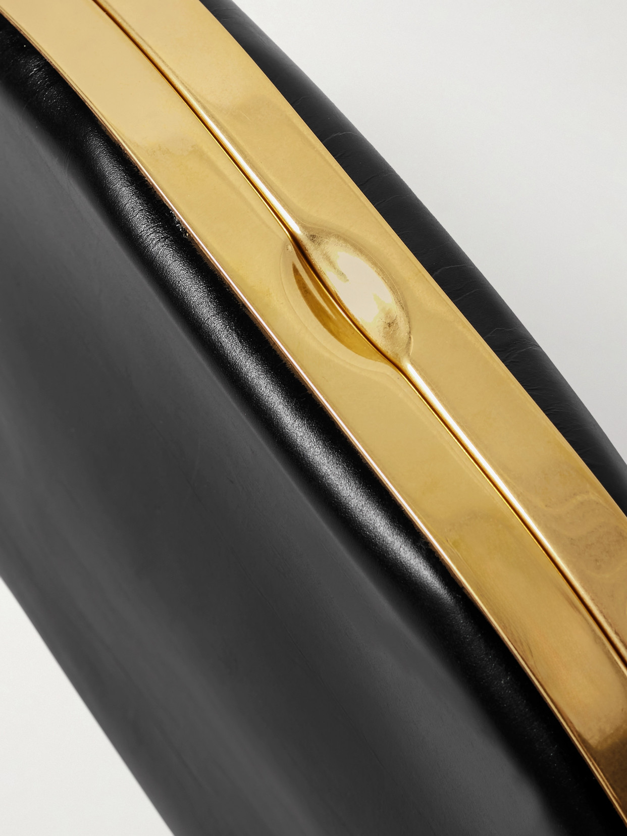 The Row Sylvia Leather Clutch In Black